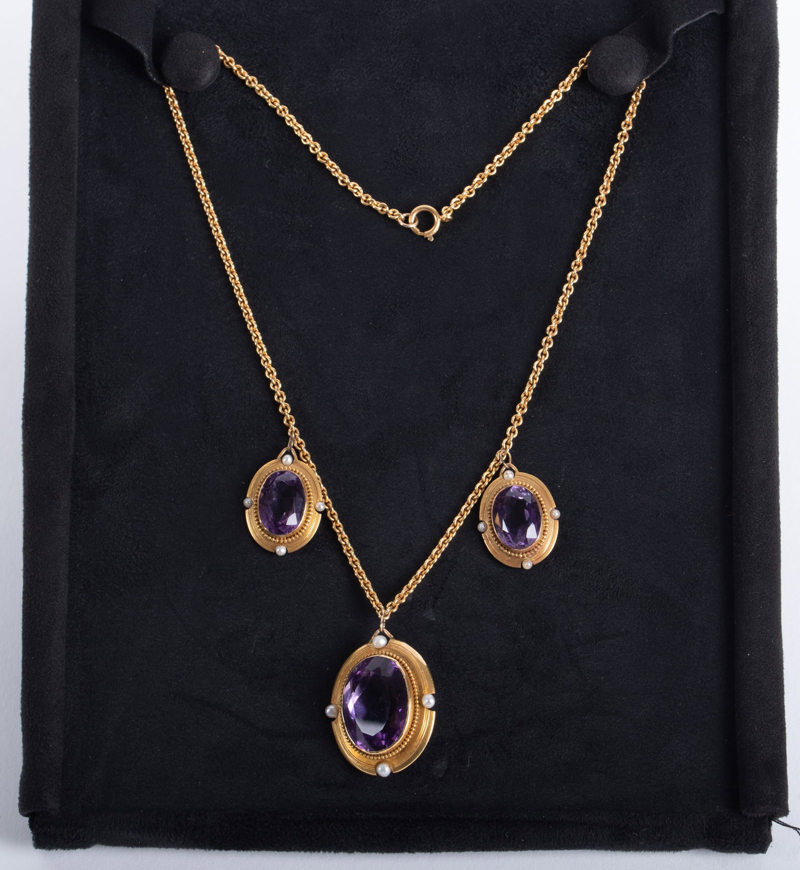 14K Yellow Gold Victorian Revival Amethyst Pearl Necklace: 14K Yellow Gold Victorian Revival Amethyst Pearl Necklace This stunning piece measures 16 inches in length and weighs 22g including the stones. The size of the center amethyst is 19.26mm x 14.70mm, th