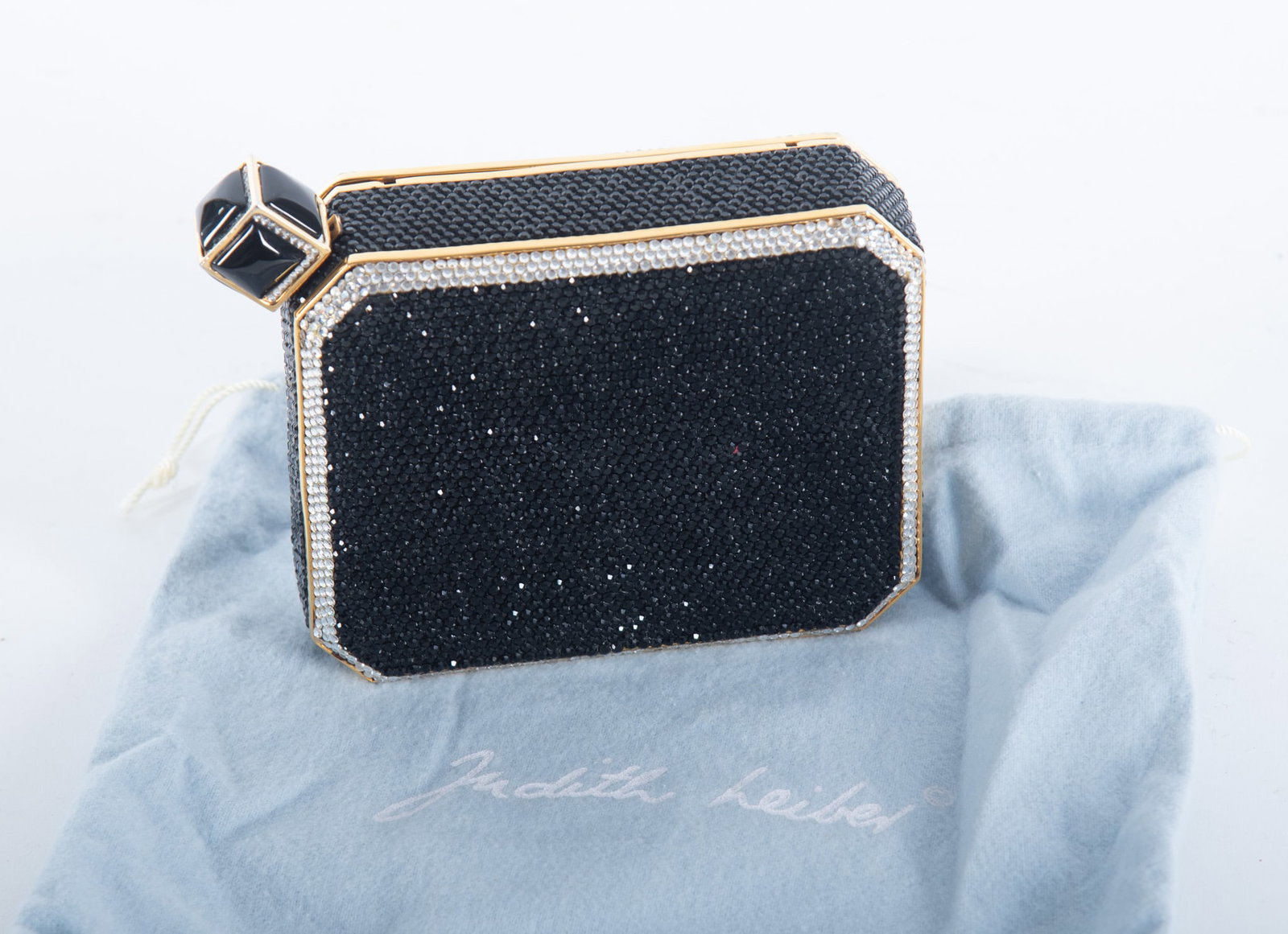 Judith Leiber Black and Clear Crystal Jeweled Hard Case Evening Clutch Bag With Accessories: Judith Leiber Black and Clear Crystal Jeweled Hard Case Evening Clutch Bag With Accessories This lovely crystal hard case bag includes a mirror, comb and coin purse. The opener is a square push-in sty
