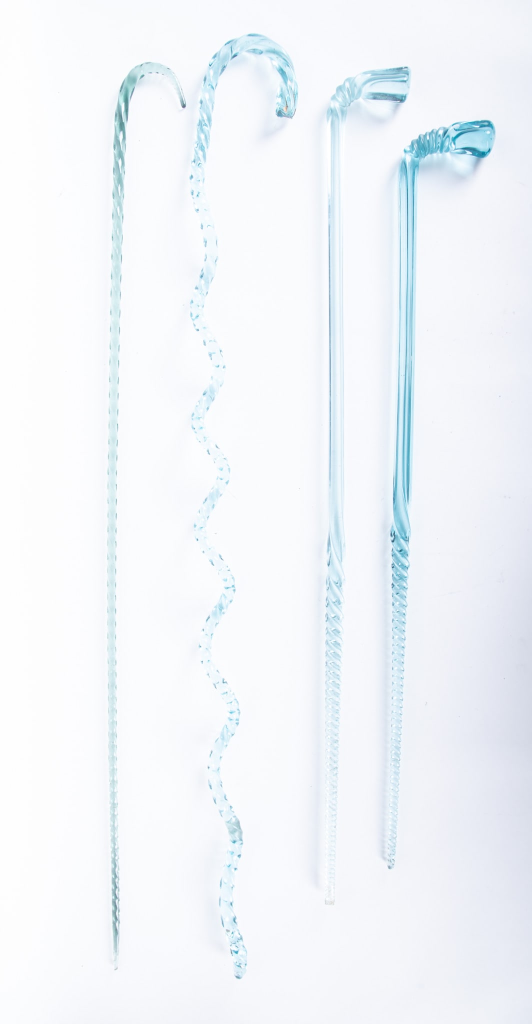 Four Blown Glass Walking Canes: Four Blown Glass Walking Canes 4 vintage glass canes with twisted handles and shafts. 31 to 41 inches in length