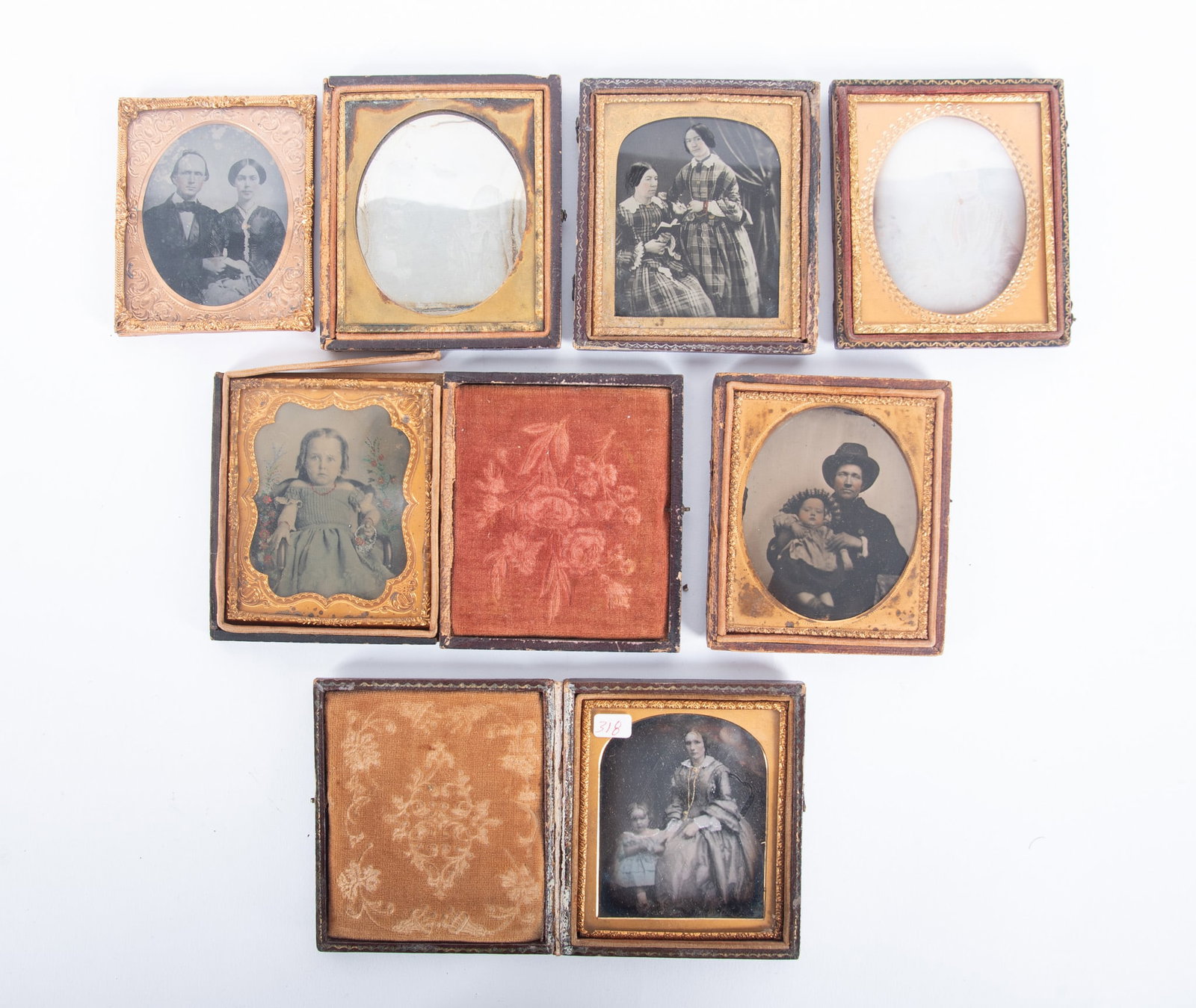 A Grouping of Four Sixth Plate Daguerreotypes and Three Ambrotypes (1 of 3)