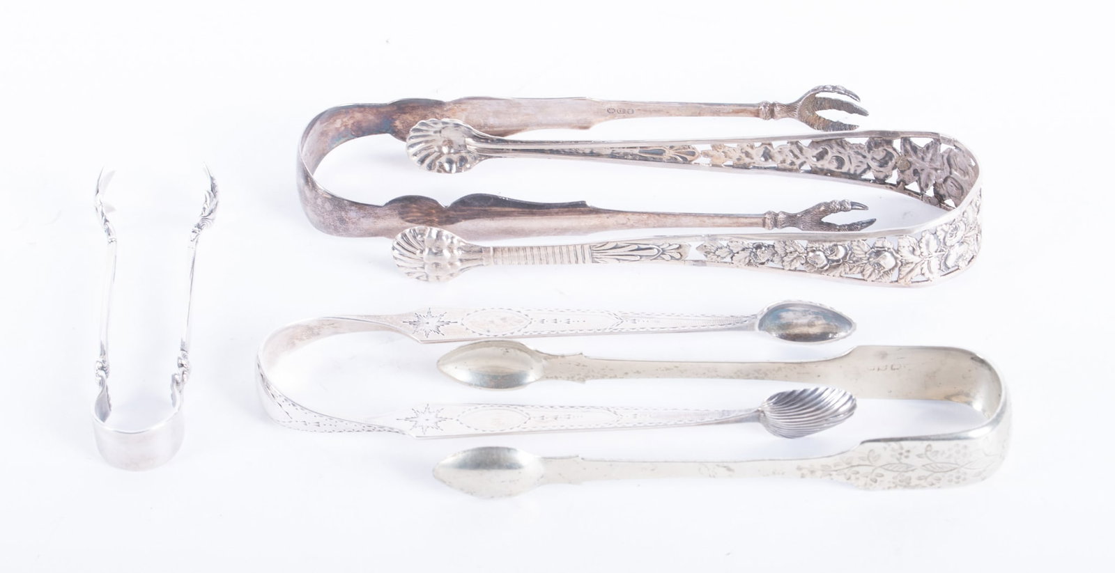 Five Antique and Vintage English, Irish and American Sterling Silver Tongs: Five Antique and Vintage English, Irish and American Sterling Silver Tongs A good collection of sterling silver tongs by various makers and countries. 6.21 total troy ounces. 4 1/4 to 6 1/4 inches