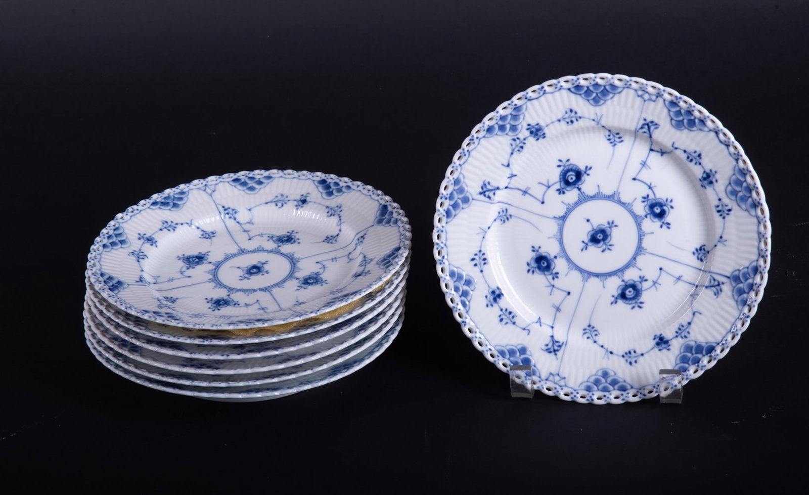A Collection of Seven Royal Copenhagen Blue Fluted Full Lace Salad Plates: A Collection of Seven Royal Copenhagen Blue Fluted Full Lace Salad Plates Denmark, circa 1954-1990, an assembled collection of 7 salad plates by Royal Copenhagen. Each plate of white ground with delic