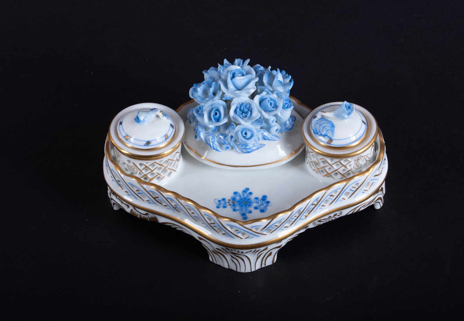 A Vintage Herend Blue Floral Inkwell: A Vintage Herend Blue Floral Inkwell Hungary, the hand-painted Herend porcelain ink stand having blue botanicals on the lids and central design, with gold highlights 3 3/8 x 5 1/4 x 3 1/4 inches