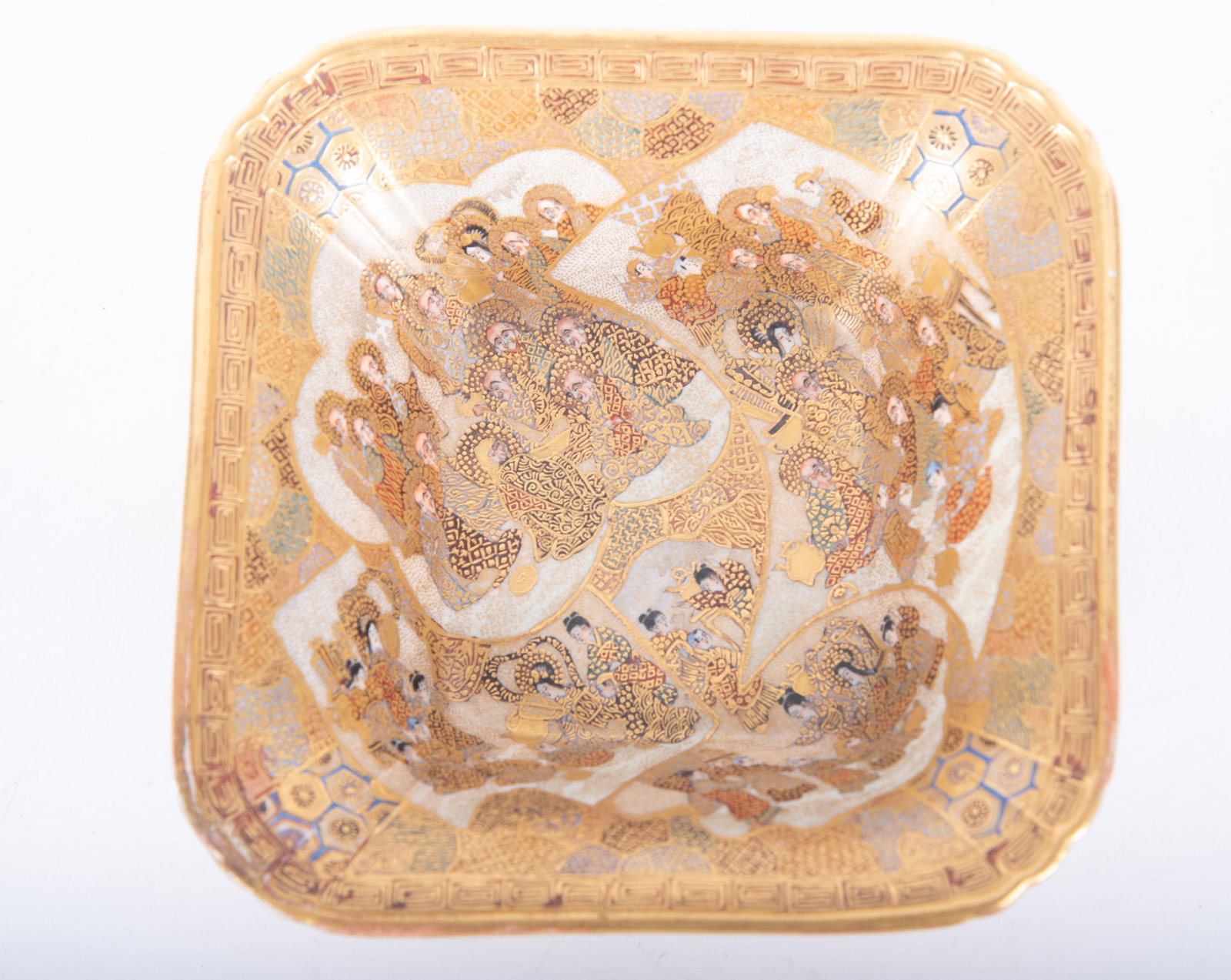 A Fine Japanese Satsuma Square-Form Bowl: A Fine Japanese Satsuma Square-Form Bowl Japan, Meiji period, a very finely decorated bowl, the central deep-well area decorated with numerous immortals and deep gilt finishes. The sides decorated wit