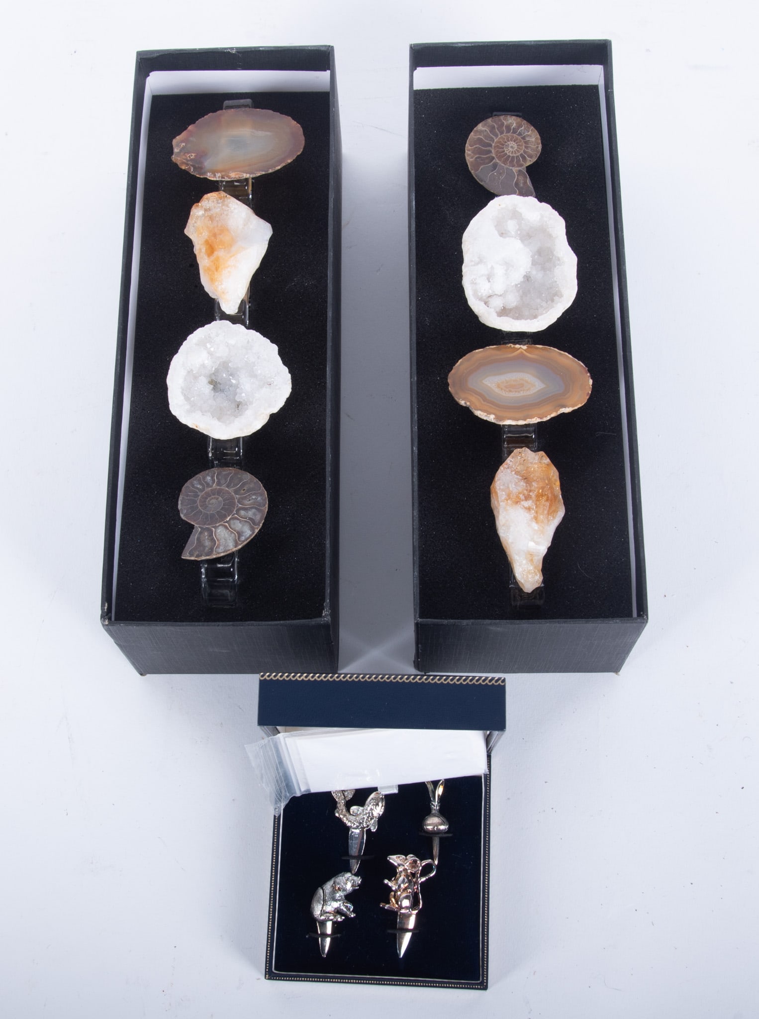 Two boxed sets of Napkin Rings with Agate Slices, Trilobites, Geodes, and Crystal; together with a (1 of 2)