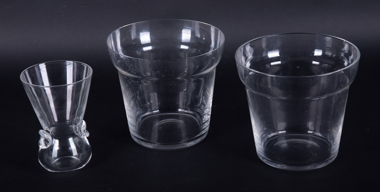 A Pair of Tiffany & Co. Crystal Flower Pots; together with a Steuben Signet Vase: A Pair of Tiffany & Co. Crystal Flower Pots; together with a Steuben Signet Vase Three Pieces Height of flower pots: 6 1/2 inches; Height of Steuben: 6 inches