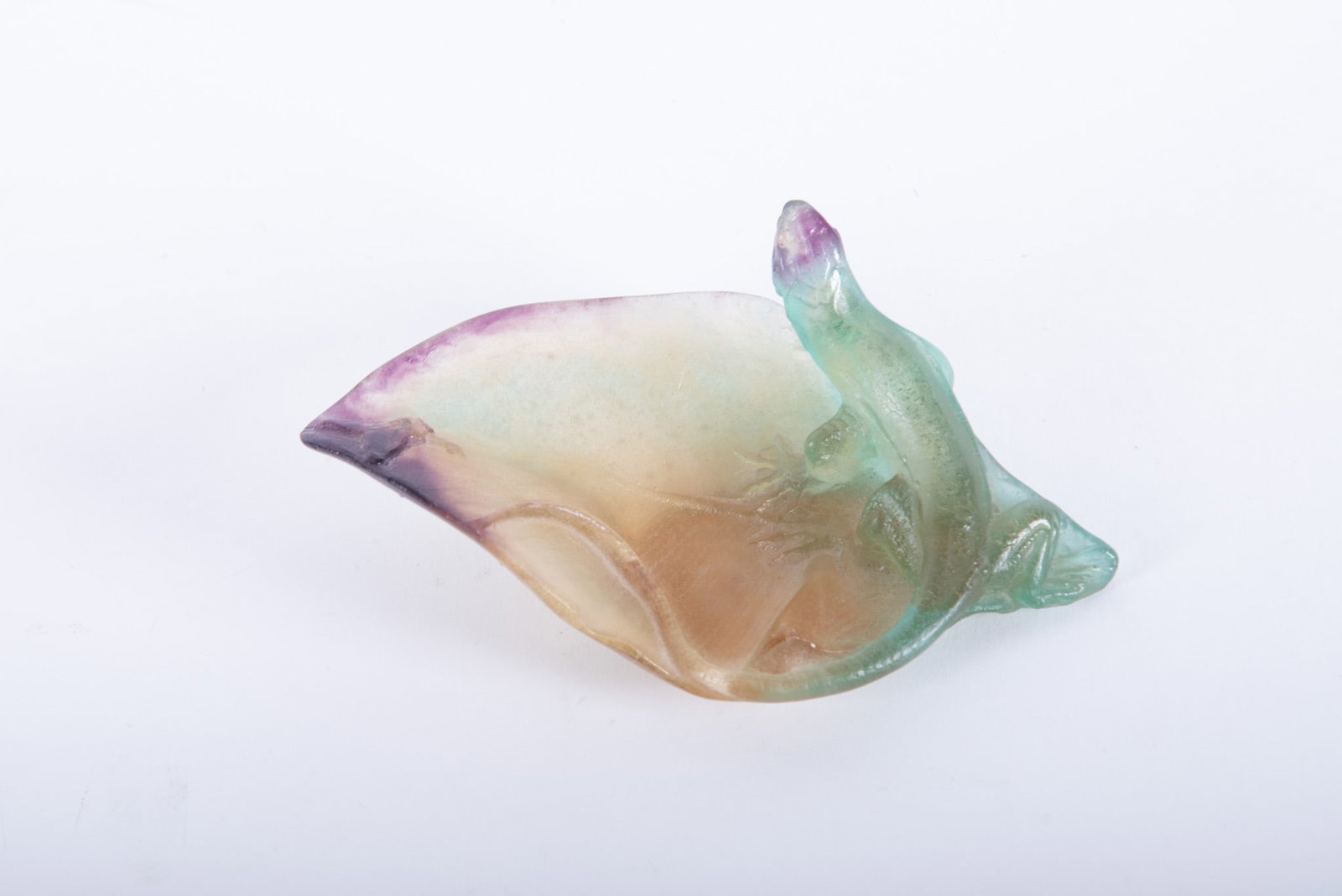 Daum France Pate De Verre Lizard Dish: Daum France Pate De Verre Lizard Dish A vide-poche or trinket dish featuring a sculpted lizard resting on an organic leaf form. Marked on underside Daum France. 1 3/4 x 5 1/4 x 3 inches