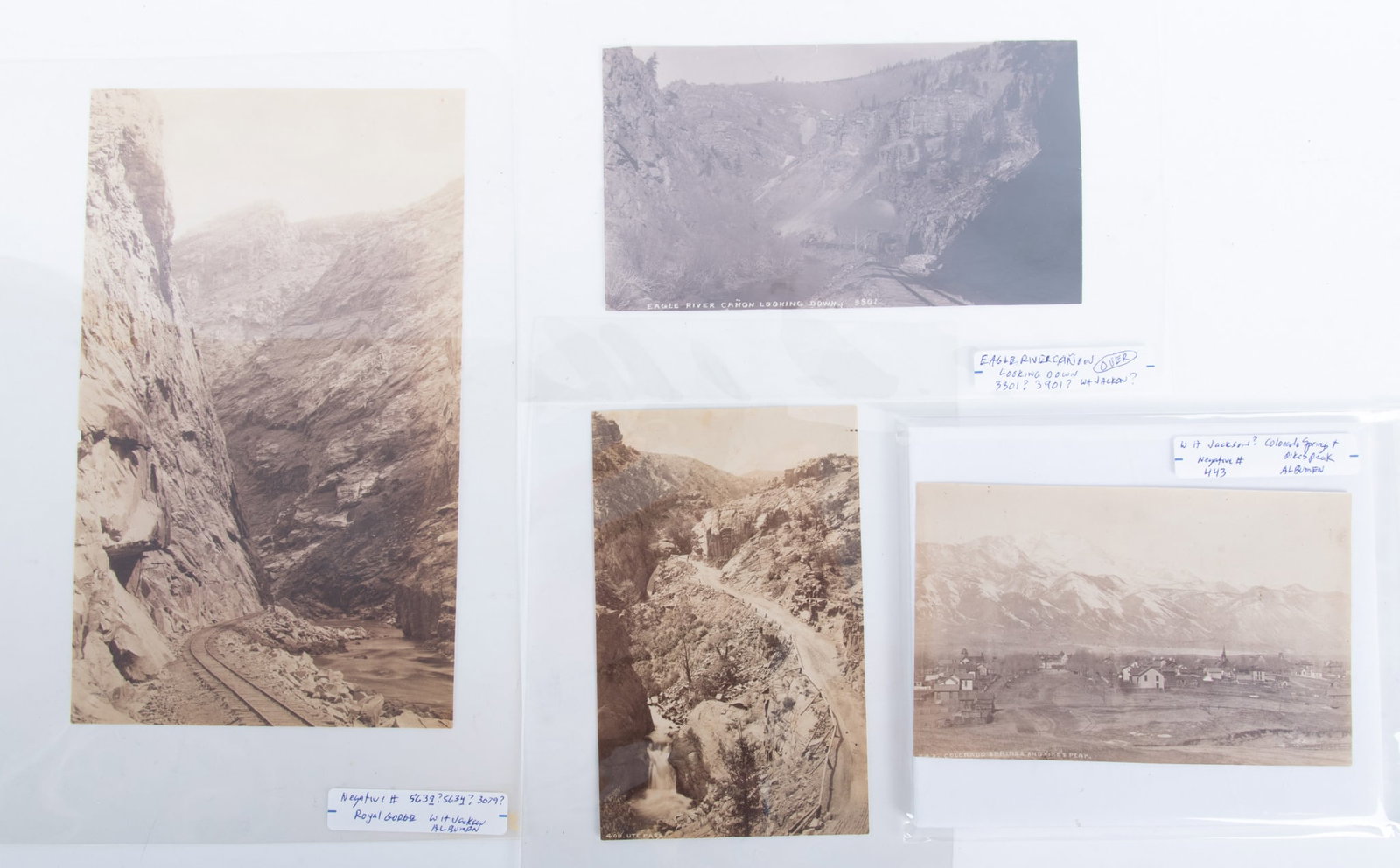 William Henry Jackson, American (1843-1942), Four Mountain Landscapes: Colorado Springs and Pike's: William Henry Jackson American, (1843-1942) Four Mountain Landscapes: Colorado Springs and Pike's Peak, neg. # 443; Eagle River Canyon Looking Down, neg. #3301; Ute Pass, neg. # 406; and Royal Gorge, 