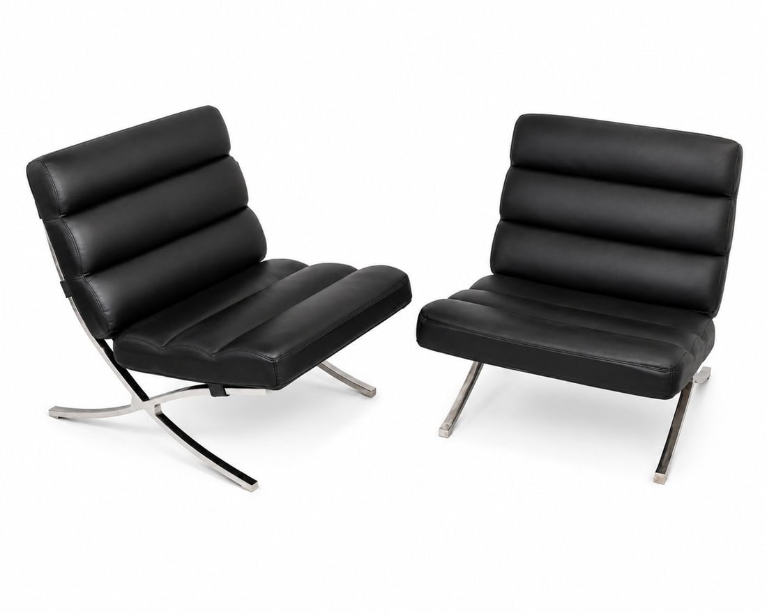 Pair of Contemporary Barcelona Style Lounge Chairs: Pair of Contemporary Barcelona Style Lounge Chairs Barcelona design lounge chairs having black upholstered seat and back cushions on polished chrome steel frames with black webbed supports. 36 x 30 x 