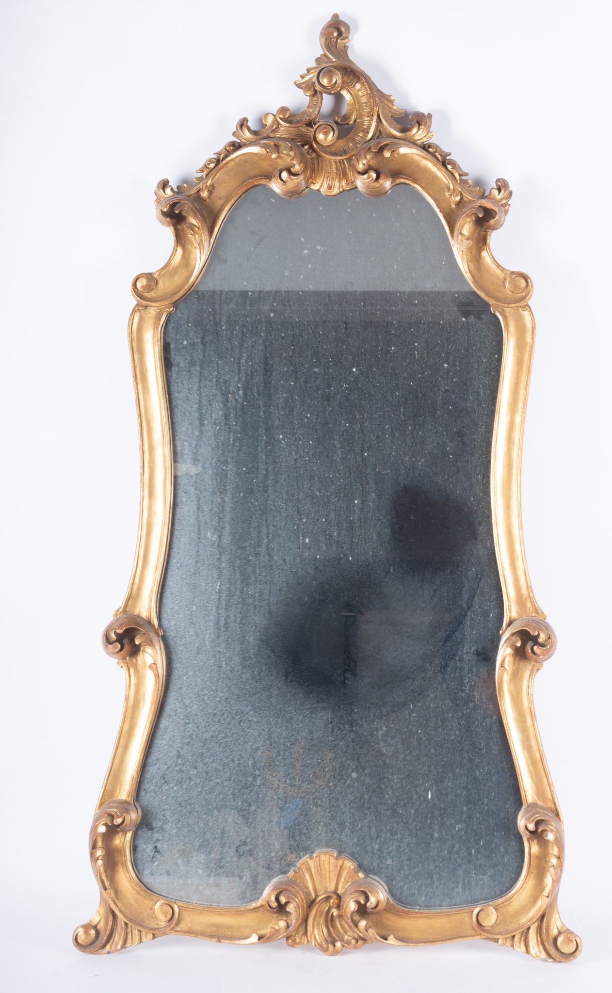 Italian Rococo Giltwood Wall Mirror, Circa 1950s: Italian Rococo Giltwood Wall Mirror, Circa 1950s 49 x 23 inches