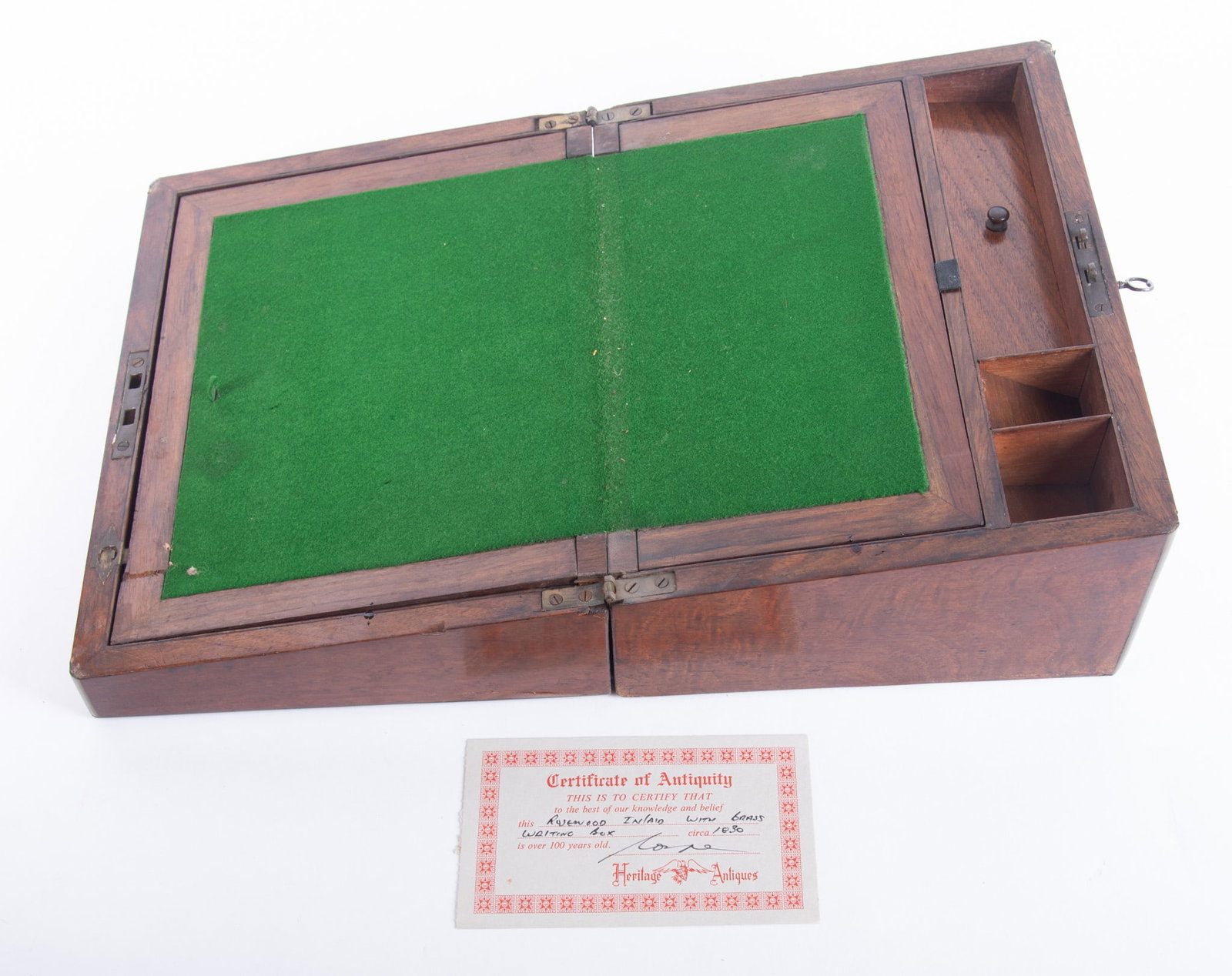 19th Century Rosewood Brass Inlaid Writing Box: 19th Century Rosewood Brass Inlaid Writing Box Circa 1830s England. The rectangular brass inlaid case opening to two part writing surface and fitted with a desk interior and small compartments for sto