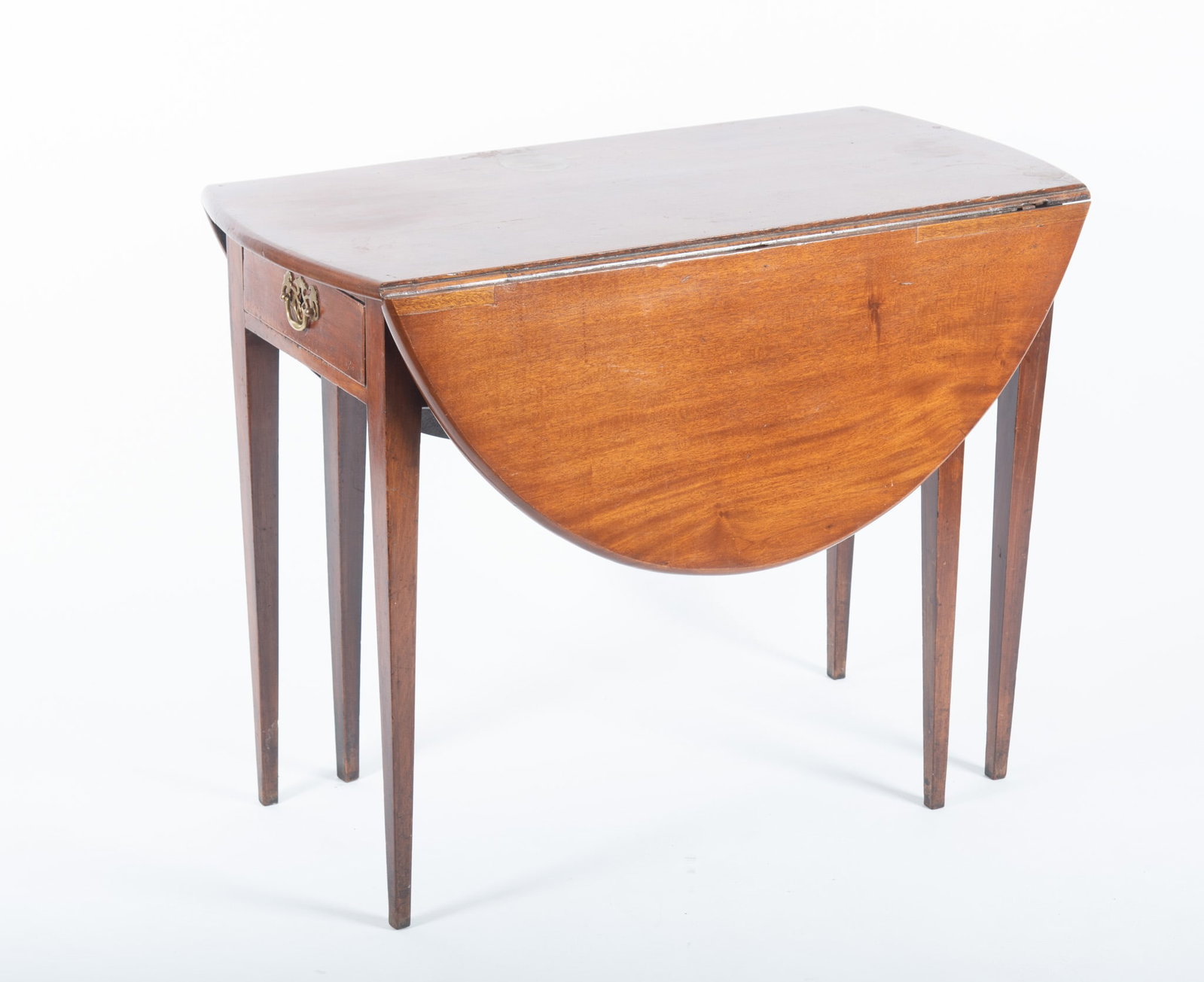 Antique English George III Mahogany Table: Antique English George III Mahogany Table With twin drop leaves and gateleg support with single drawer raised on tapering legs. 27 1/2 x 37 1/2 x 43 1/2 inches extended