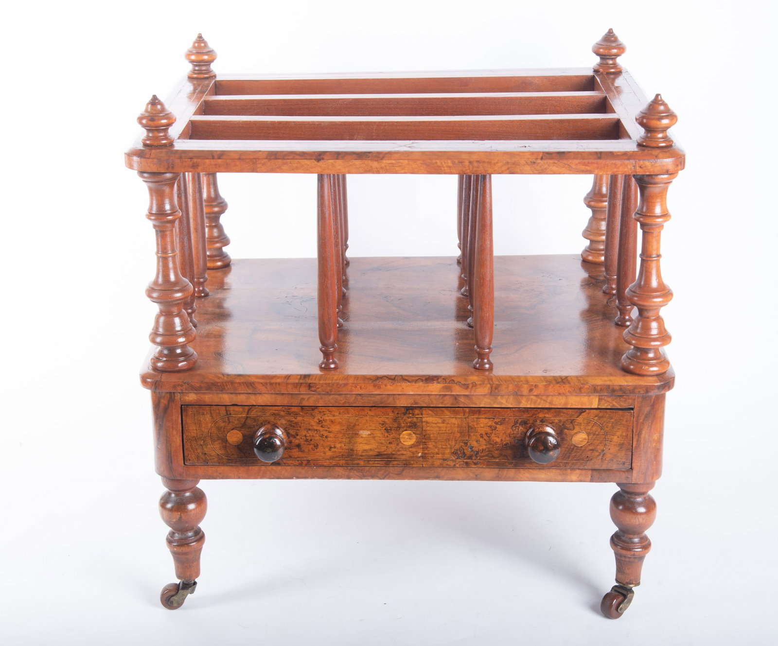 Antique English Georgian Style Canterbury: Antique English Georgian Style Canterbury Having three compartments with ribbon inlaid top edge above tapering spindle dividers with single drawer below and supported on turned vasiform corner