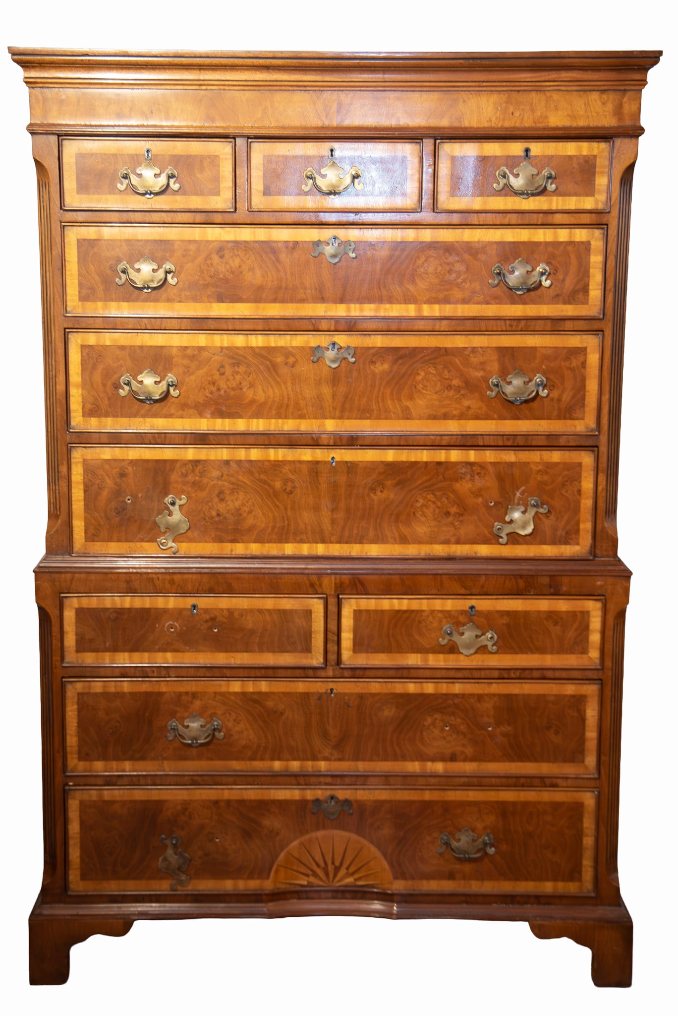 Twentieth Century English Chest On Chest: Twentieth Century English Chest On Chest Stepped and ogee form cornice above three short drawers and three long drawers with cock beading and cross banding centering a pair of fluted canted corners.
