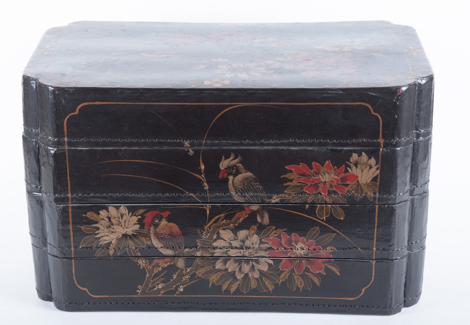 A Chinese Painted Pigskin Storage Box: A Chinese Painted Pigskin Storage Box A four-tier storage box decorated with flowers and birds on a black ground. 14 x 22 x 13 inches