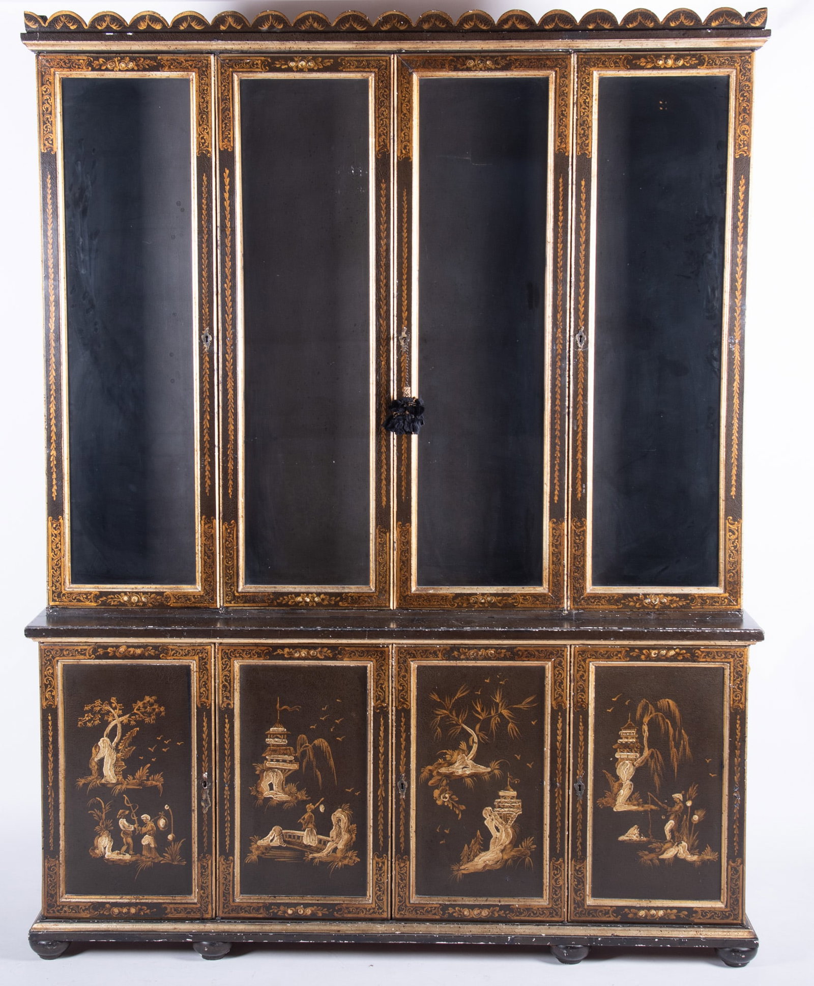 Two Member Chinese Design China Cabinet: Two Member Chinese Design China Cabinet All over Chinoiserie decoration having multiple arch forms above four glass doors. The lower section with four hinged cupboard doors. 84 x 65 x 16 1/2 inches