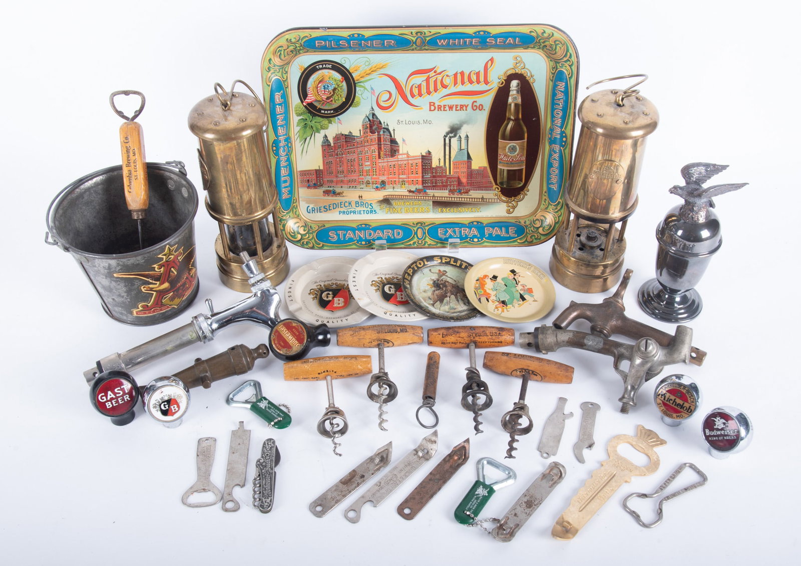 A Large Collection of Vintage St. Louis-Related Breweriana: A Large Collection of Vintage St. Louis-Related Breweriana Including a National Brewery Co. tray, a pair of Michelob brass lanterns, vintage tops and pulls (Gast Beer, Budweiser and Michelob),