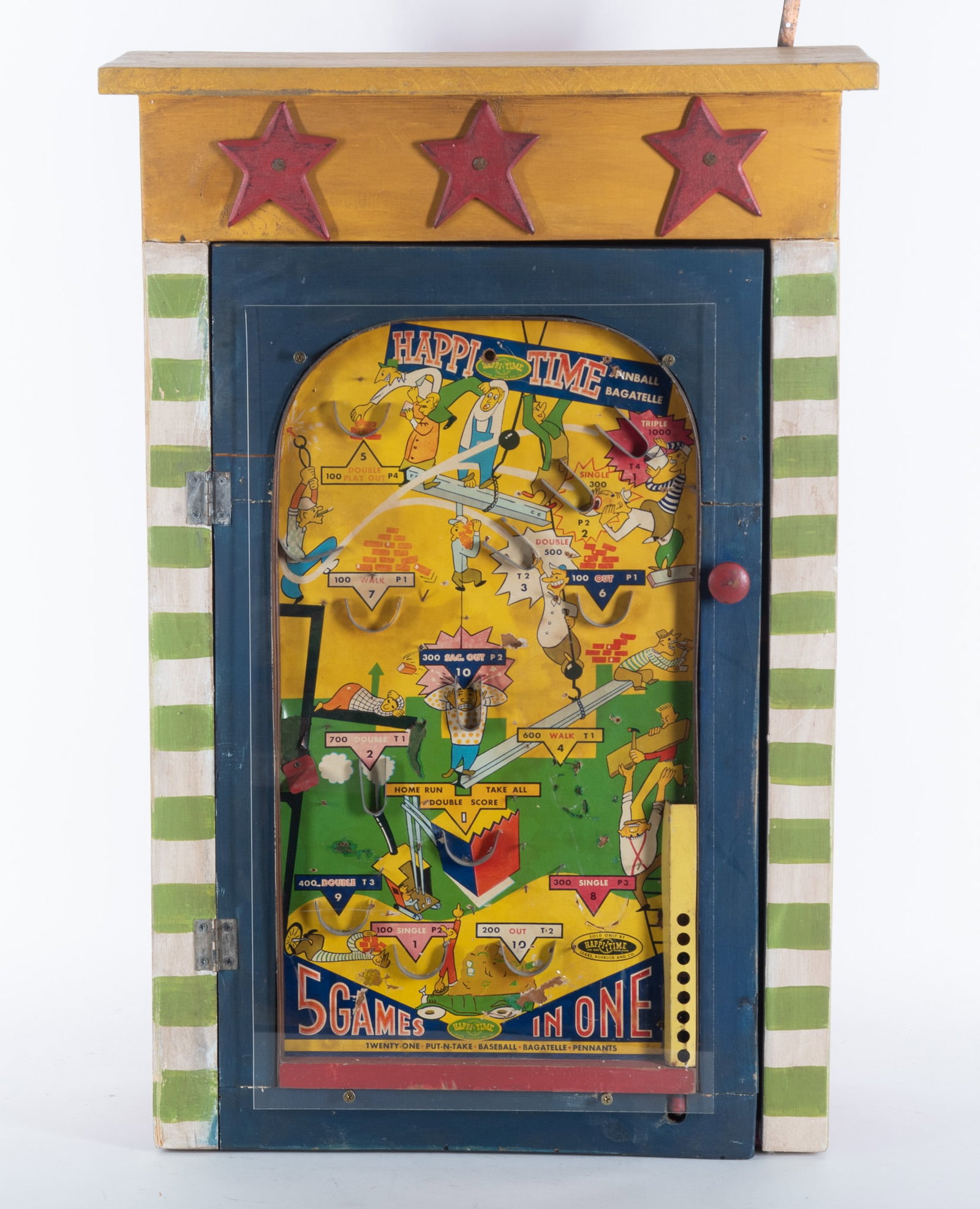 Whimsical Folk Art Handcrafted Wall-Mounted Cabinet, Circa 1960s: Whimsical Folk Art Handcrafted Wall-Mounted Cabinet, Circa 1960s The door is a 1960s vintage pinball machine, hand-painted with stripes and red star accents at the top. 31 x 21 1/2 x 9 inches