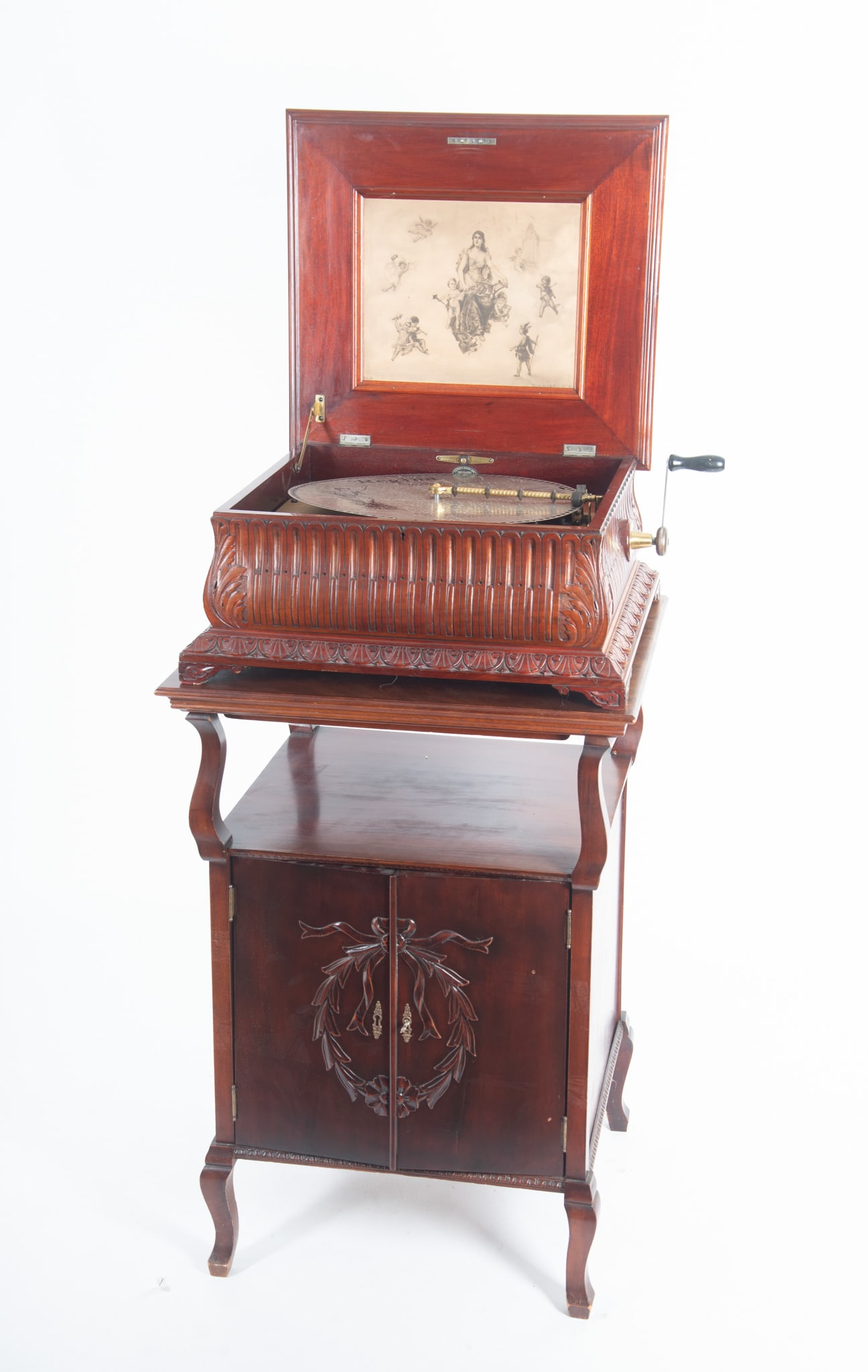 Antique Regina 15 1/2 Inch Double Comber Music Box On Stand: Antique Regina 15 1/2 Inch Double Comber Music Box On Stand The case with ogee design lid with beading opening to double combs and a lithograph of allegorical figures all resting on a double door