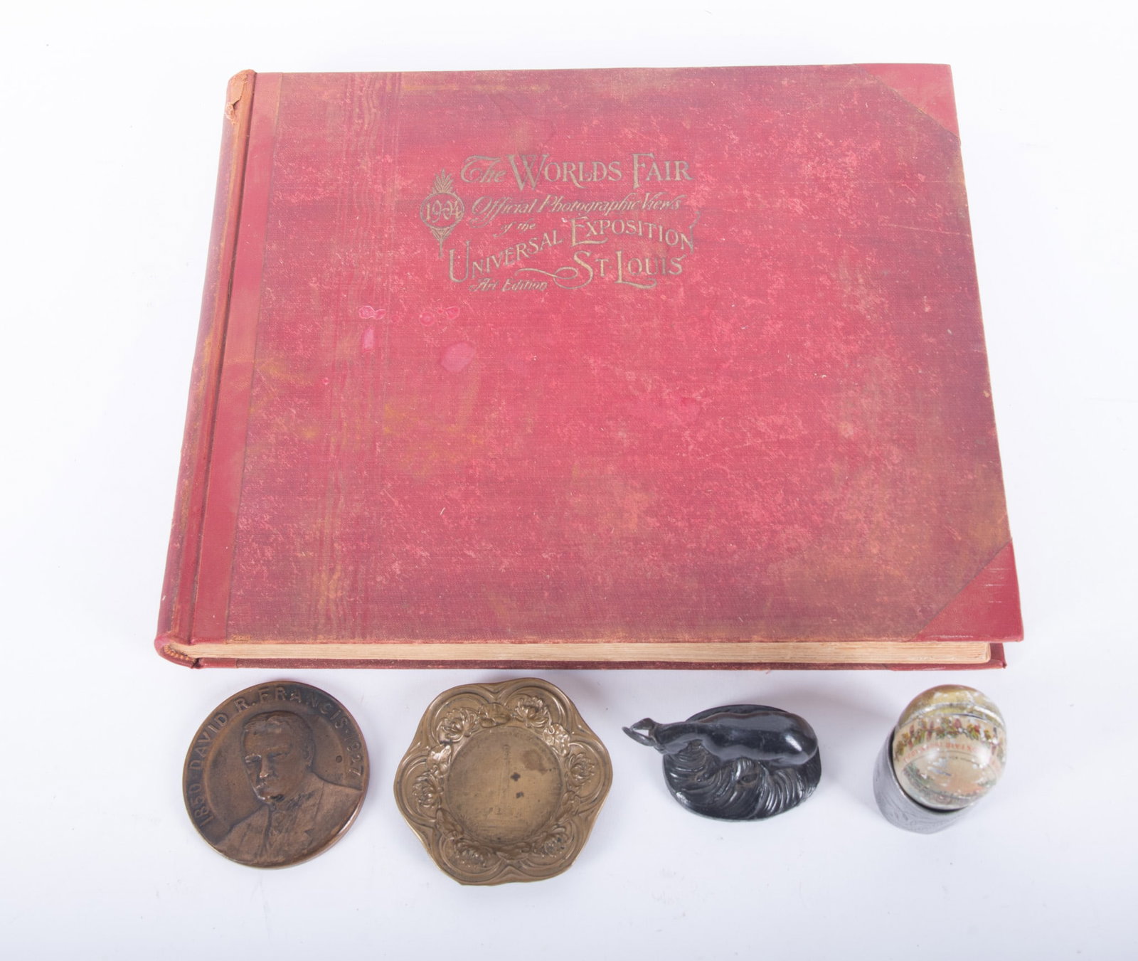 1904 St. Louis World's Fair Souvenir Collection: 1904 St. Louis World's Fair Souvenir Collection The World's Fair Official Photographic Views, Hardcover book, N. D. Thompson Publishing Co., together with a David Francis Medal; a Metal Donkey