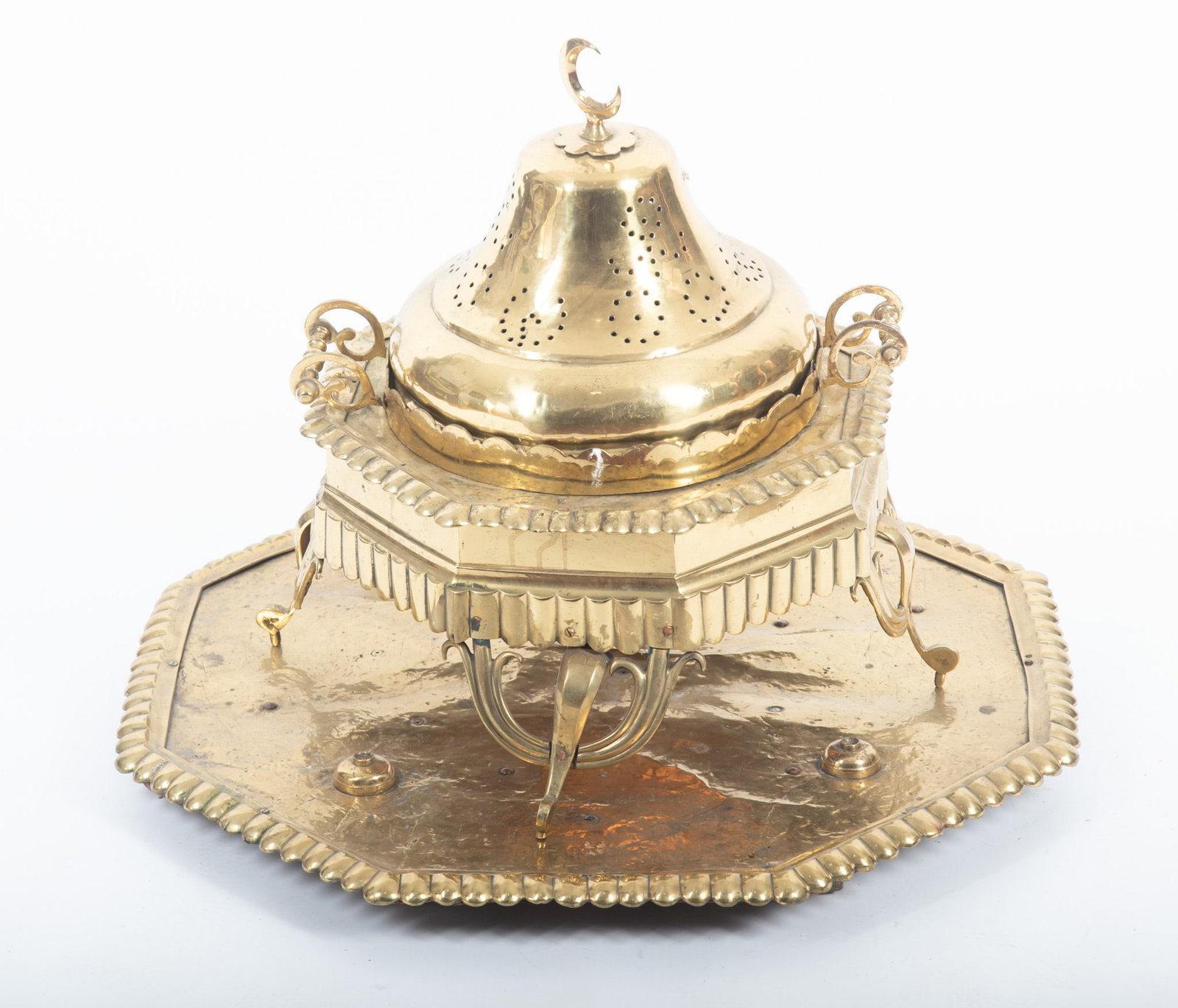 Large Vintage Polished Brass Turkish Brazier: Large Vintage Polished Brass Turkish Brazier Having a pierced dome lid with crescent moon finial and resting on a matching brass tray. Height: 24 inches; Diameter of tray: 30 inches