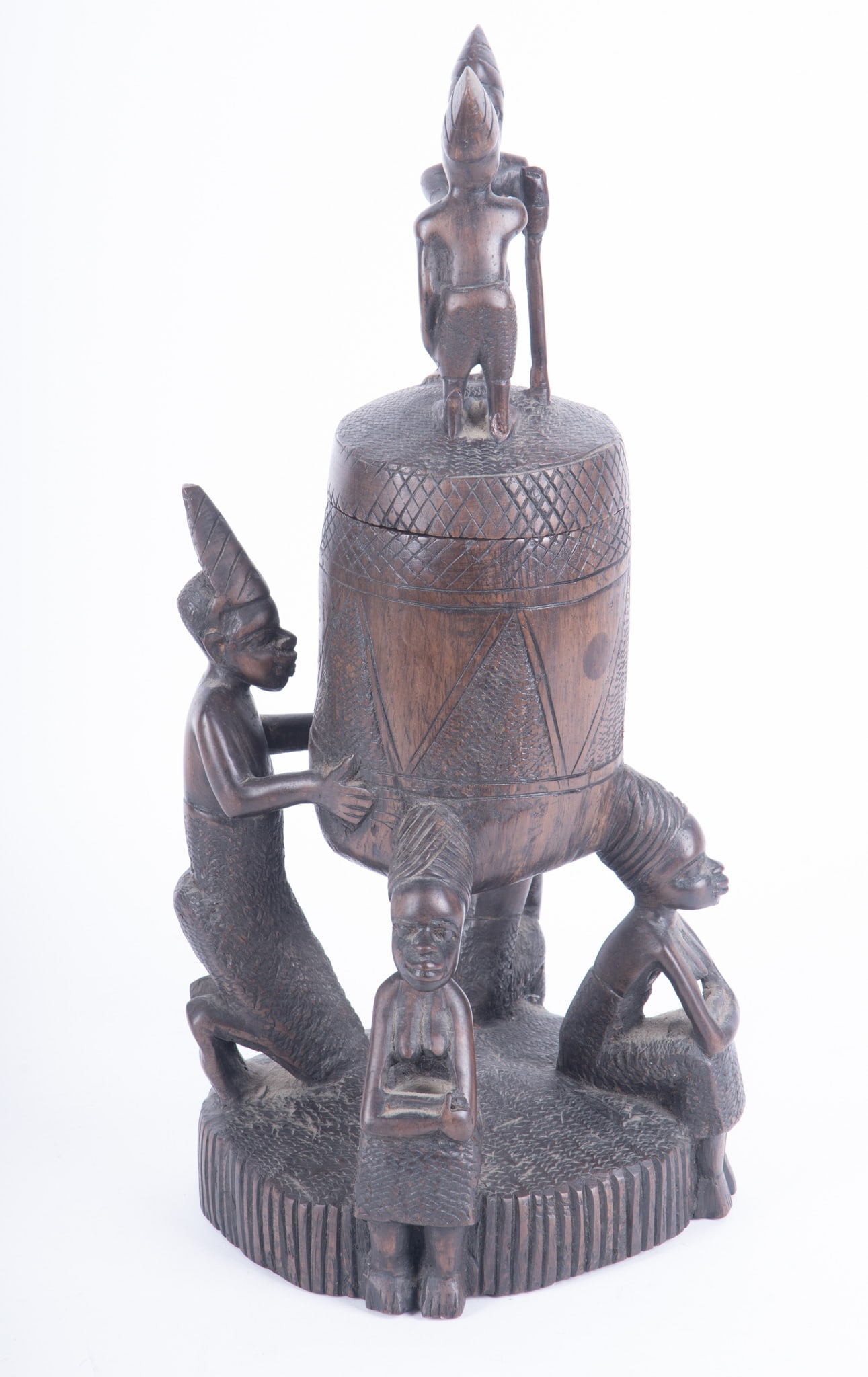 African Tall Carved Wood Lidded Vessel: African Tall Carved Wood Lidded Vessel Three seated female figures around the base along with a larger male figure holding up vessel. Atop the lid are two male figures in greeting. 19 1/2 x 9 x 9 inch