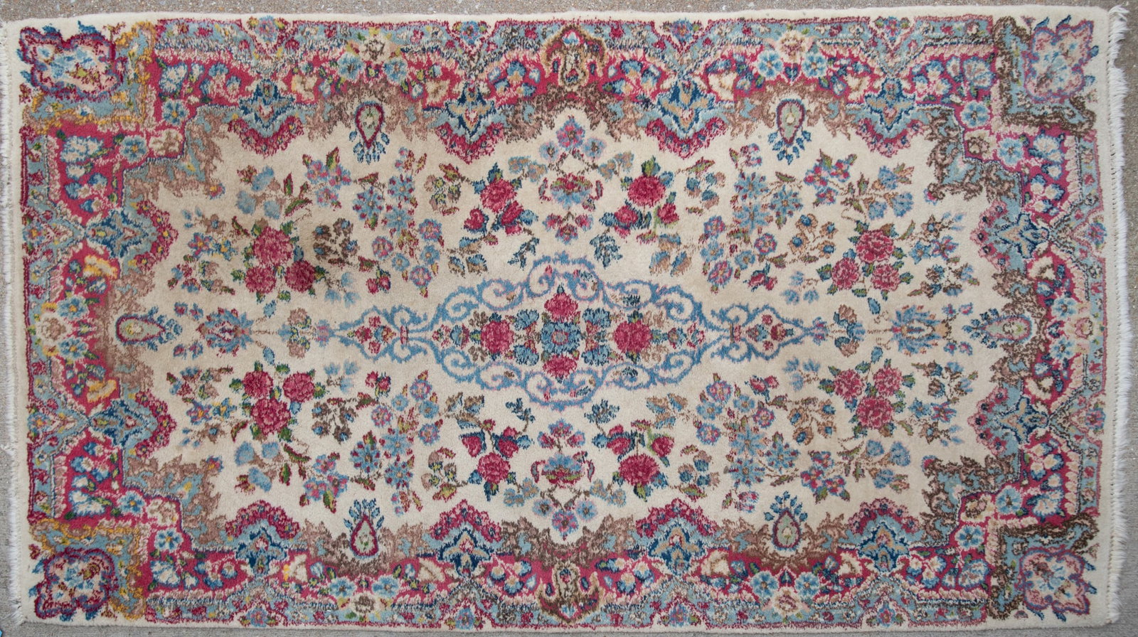 Handwoven Persian Design throw Rug: Handwoven Persian Design throw Rug Ivory field with all over rose decoration and leaf designs. 2' 11" x 5' 4"