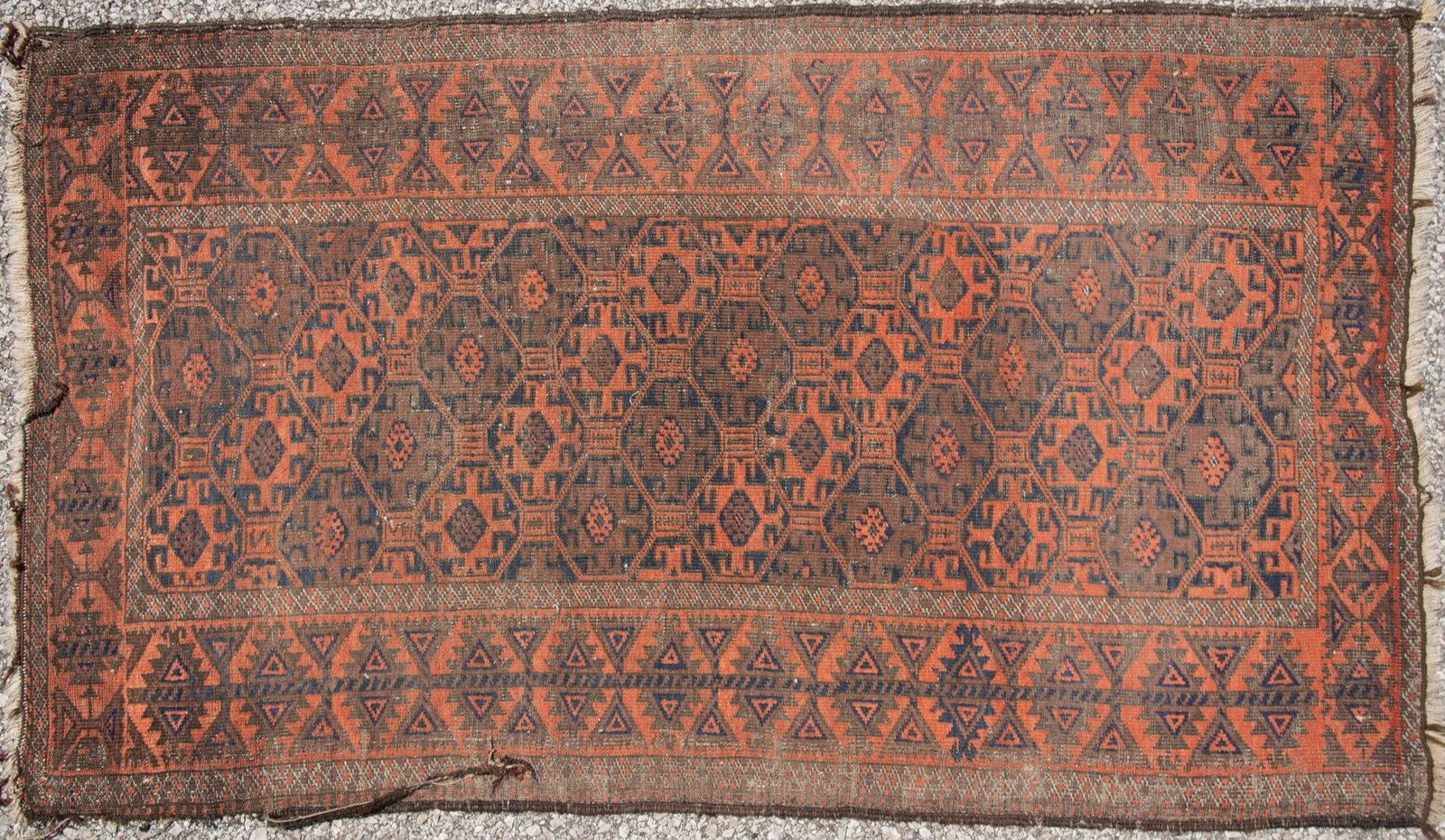Antique Handwoven Persian Baluchi Area Rug: Antique Handwoven Persian Baluchi Area Rug Repetitive pattern in alternating shades of brown and orange centered by a geometric border. 2' 10" x 4' 9"