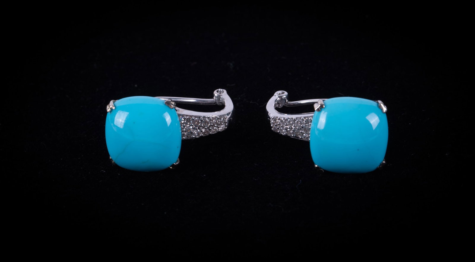 14K White Gold Earrings w/Diamonds & Turquoise: 14K White Gold Earrings w/Diamonds & Turquoise These lovely earrings have .30 CTW in diamonds. The turquoise stones measure 12.6mm x 12.6mm. Gross weight is 9.4g.