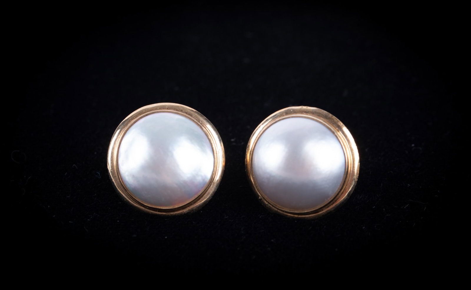 Mabe Pearl Earrings set in 14K Yellow Gold: Mabe Pearl Earrings set in 14K Yellow Gold The pearls measure 11.8mm and the weight including pearls is 3.5g.