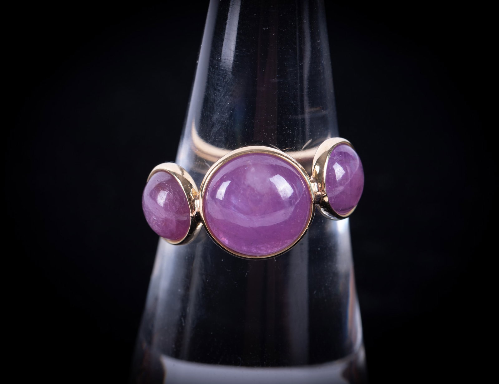 18K Yellow Gold Natural Ruby Triple Stone Ring: 18K Yellow Gold Natural Ruby Triple Stone Ring The rubies in this ring have a total weight of 9.65 carats. It is size 7 and weighs 3.9g including stones.
