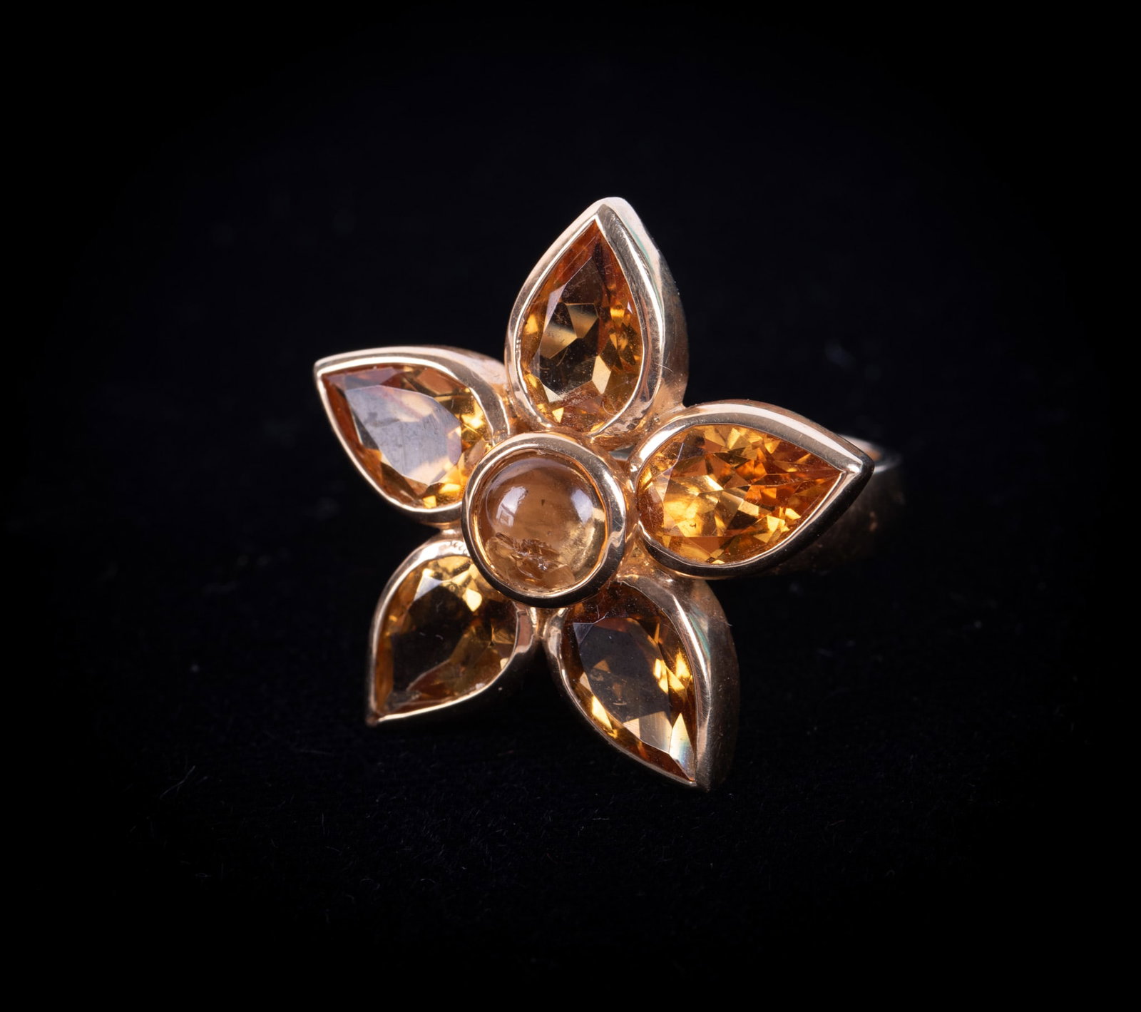 Stunning 14K Yellow Gold Madeira Citrine Ring: Stunning 14K Yellow Gold Madeira Citrine Ring This unusual design has 6.82CTW in citrines. Ring size is 7 with the weight including stones being 8.5g.