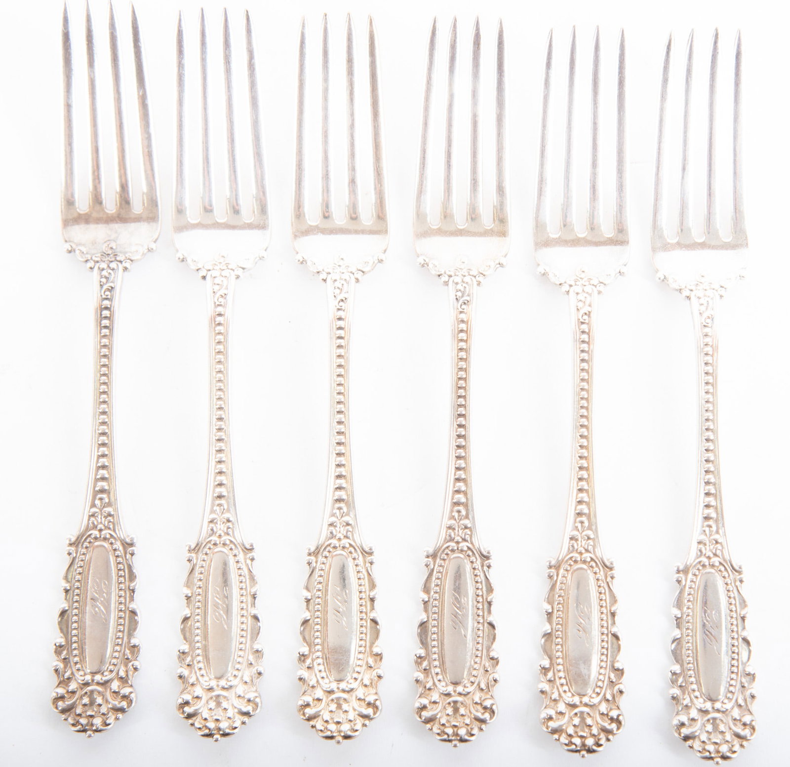 Six Antique American Dinner Forks, Eugenie by Watson: Six Antique American Dinner Forks, Eugenie by Watson 6 matching sterling silver 7 1/8 inch forks in the Eugenie pattern, introduced by Watson in 1895. 10.54 total troy ounces 7 1/8 inches long