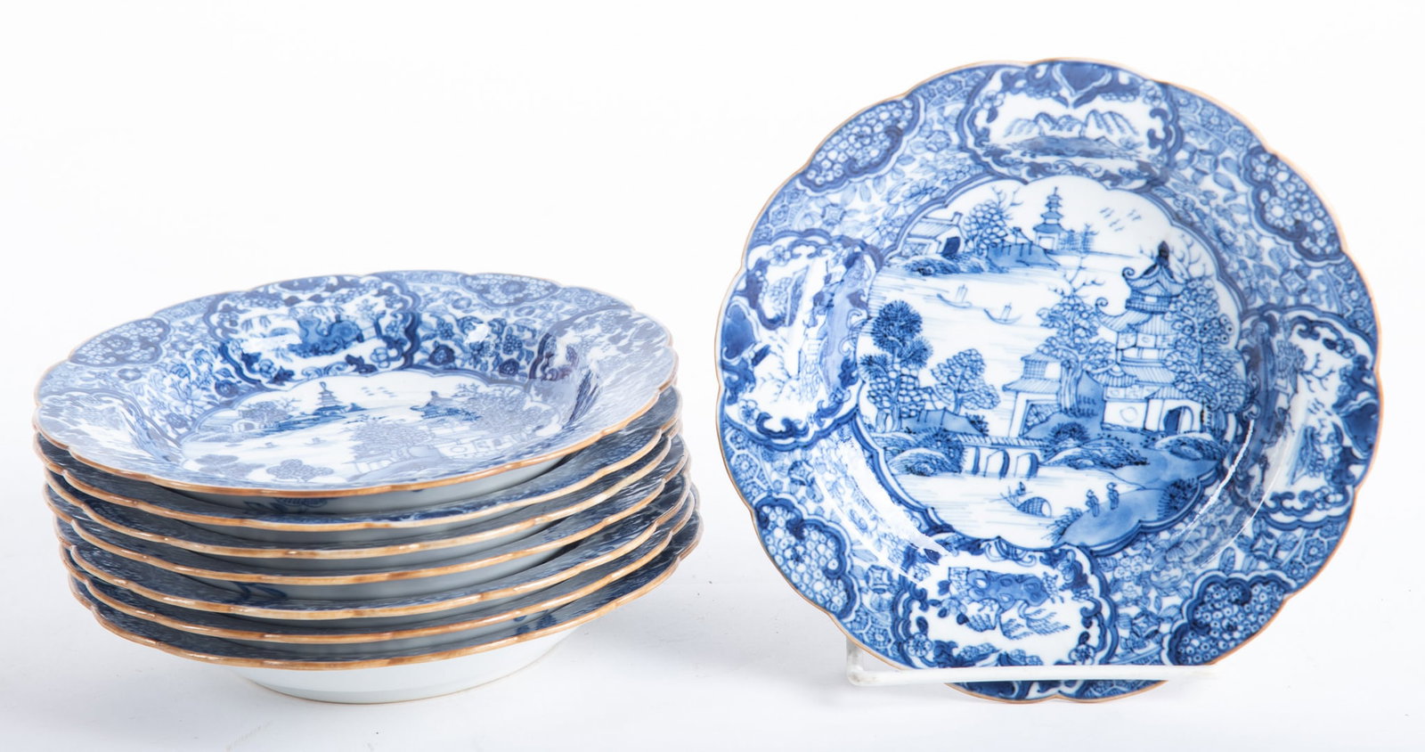 Eight 18th Century Chinese Export Blue and White Porcelain Desert Bowl: Eight 18th Century Chinese Export Blue and White Porcelain Desert Bowl Qianlong, a set of 8 scalloped and gilt-edge bowls having central pagoda and river landscape pattern, the wide borders lavishly