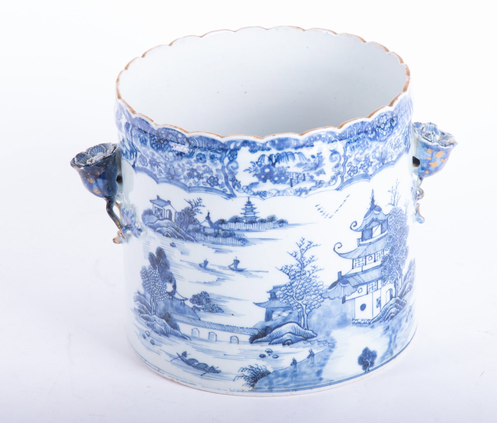 A Rare 18th Century Chinese Export Blue and White Porcelain Wine Cooler: A Rare 18th Century Chinese Export Blue and White Porcelain Wine Cooler Qianlong, an exceptionally difficult to find large floral-handled cylindrical shaped vessel. Each side with large pagoda and riv
