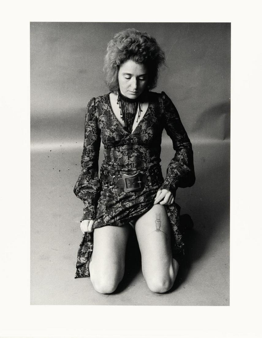 TATOO I: Artist: Valie Export Black and white photograph on photo paper. 1972/1996. C. 25.5 x 18 cm (sheet c. 30.5 x 24 cm). A numbered copy from an edition of 30 from 1996. Signed, dated, and titled on the re