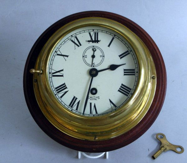 Smith's Astral brass cased ships clock with second: Smith's Astral brass cased ships clock with second hand, GWO with winding key, dial 16 cm diameter