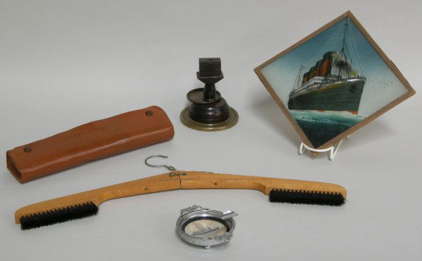 Souvenirs, mahogany and brass shell case base asht: Souvenirs, mahogany and brass shell case base ashtray and match box holder marked HMS "Lassoo", painting on glass White Star Liner "Olympic - 18 cm square, Clan Line Steamers folding coat hanger with
