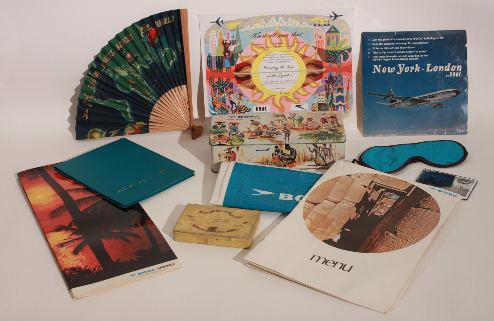 BOAC company ephemera, souvenirs and and badges, including unused fan "Speedbird Routes Around the (1 of 1)