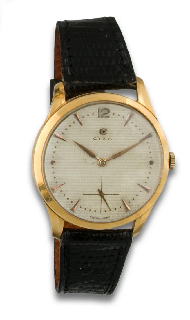 GOLD CYMA WATCH FOR MEN: CYMA 60's wristwatch mechanical movement, 18kt yellow gold case, beige dial, Arabic numerals and index, second hand at 6 o'clock, leather strap, metal buckle, needs revision. . JEWELRY
