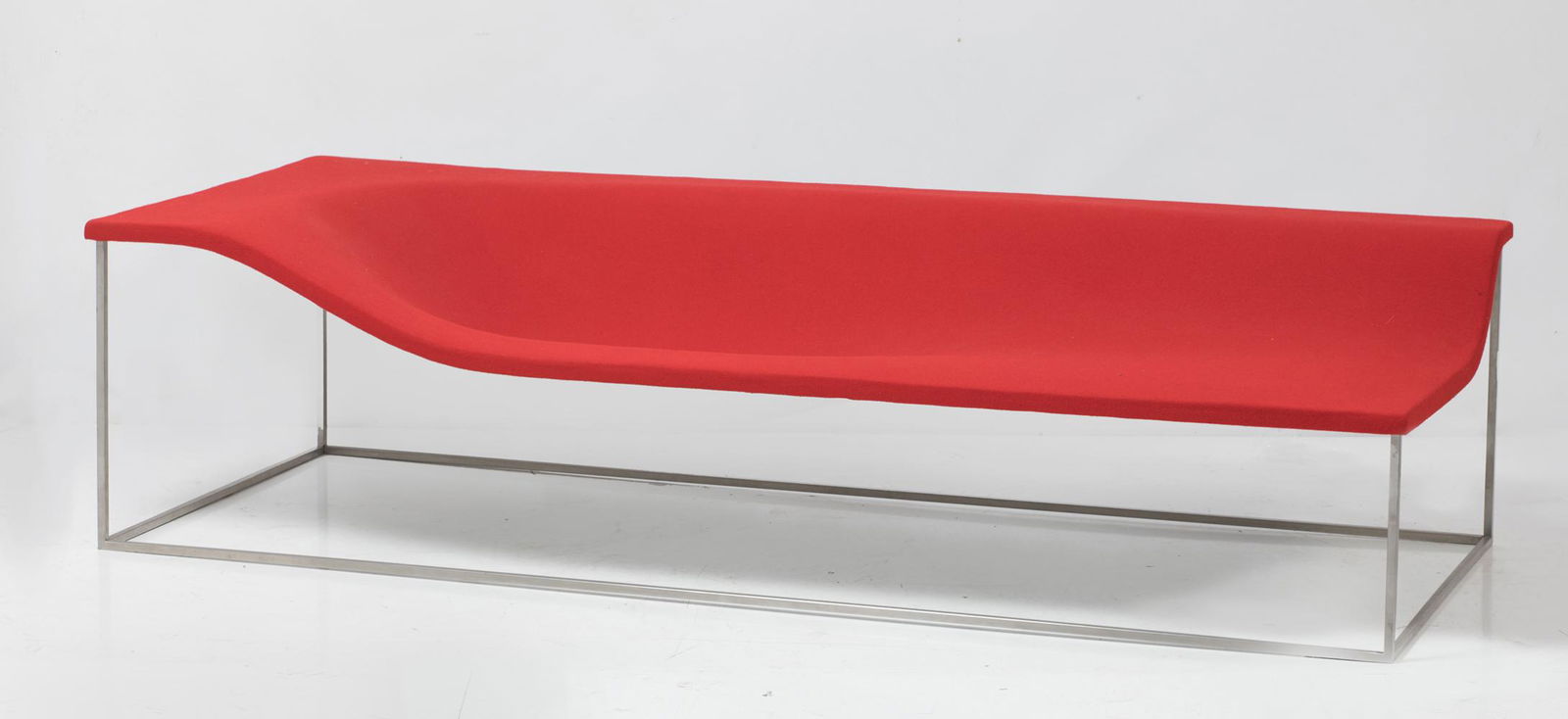 Lounge chair Outline Massaud of Cappellini: Long chair "Outline". design by Jean Marie Massaud for Cappellini, 2002. Fiberglass upholstered in red on metal frame. With Cappellini stamp. .