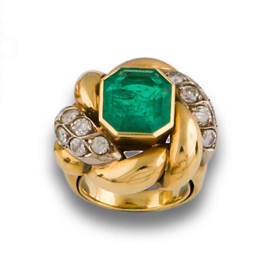 80'S EMERALD DIAMOND RING 190: 18kt yellow and white gold ring with emerald-cut emerald and brilliant-cut diamonds in the centre of it .
