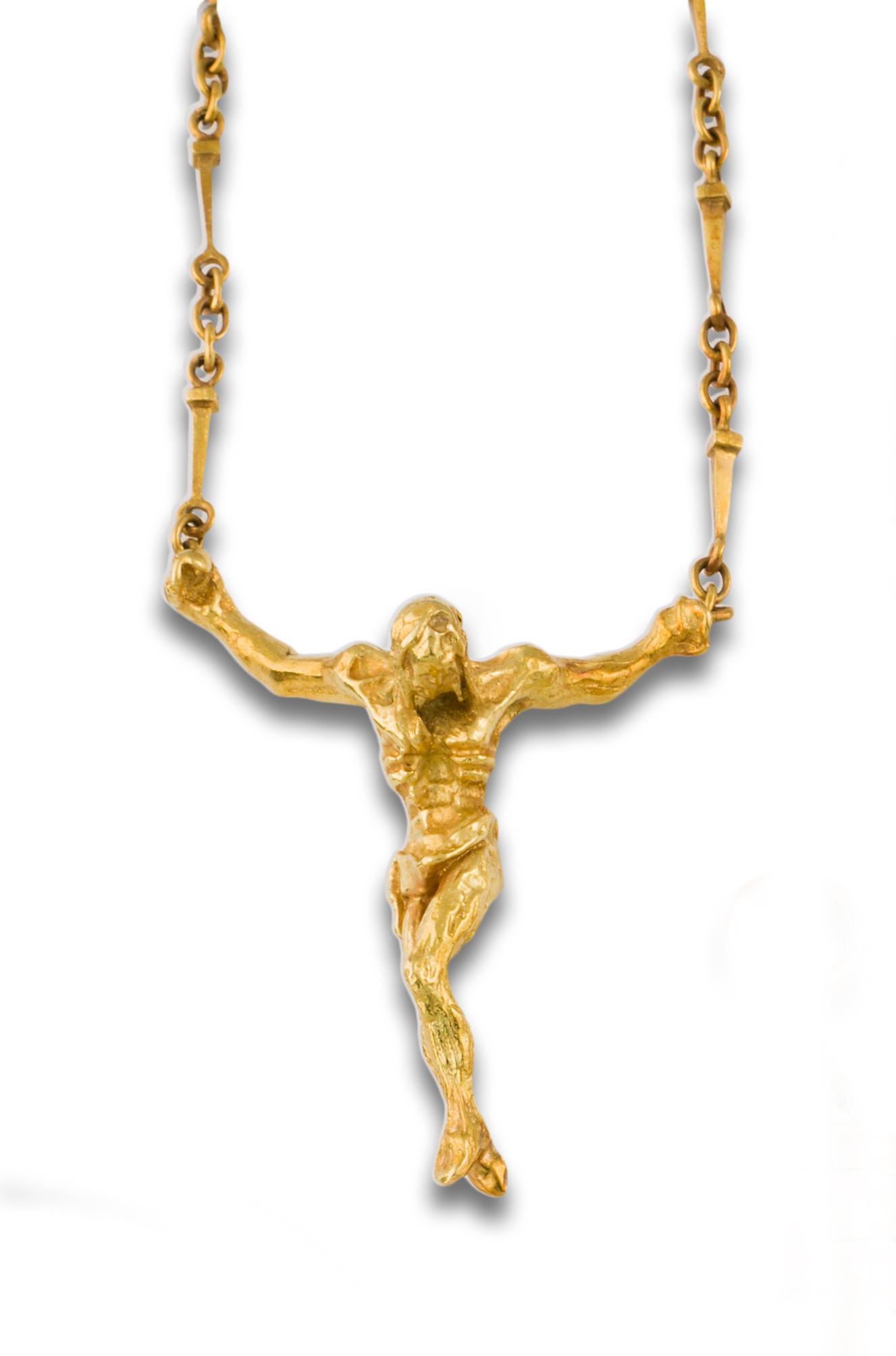 CHAIN AND PENDANT OF CHRIST OF f DALI 18kts: Chain and pendant Christ of DALI 18kts yellow gold, chain with nail motifs, representation of the crucified Christ, clasp Signed Dali, numbered A-588, enclosed original case and certificate Exmundart 