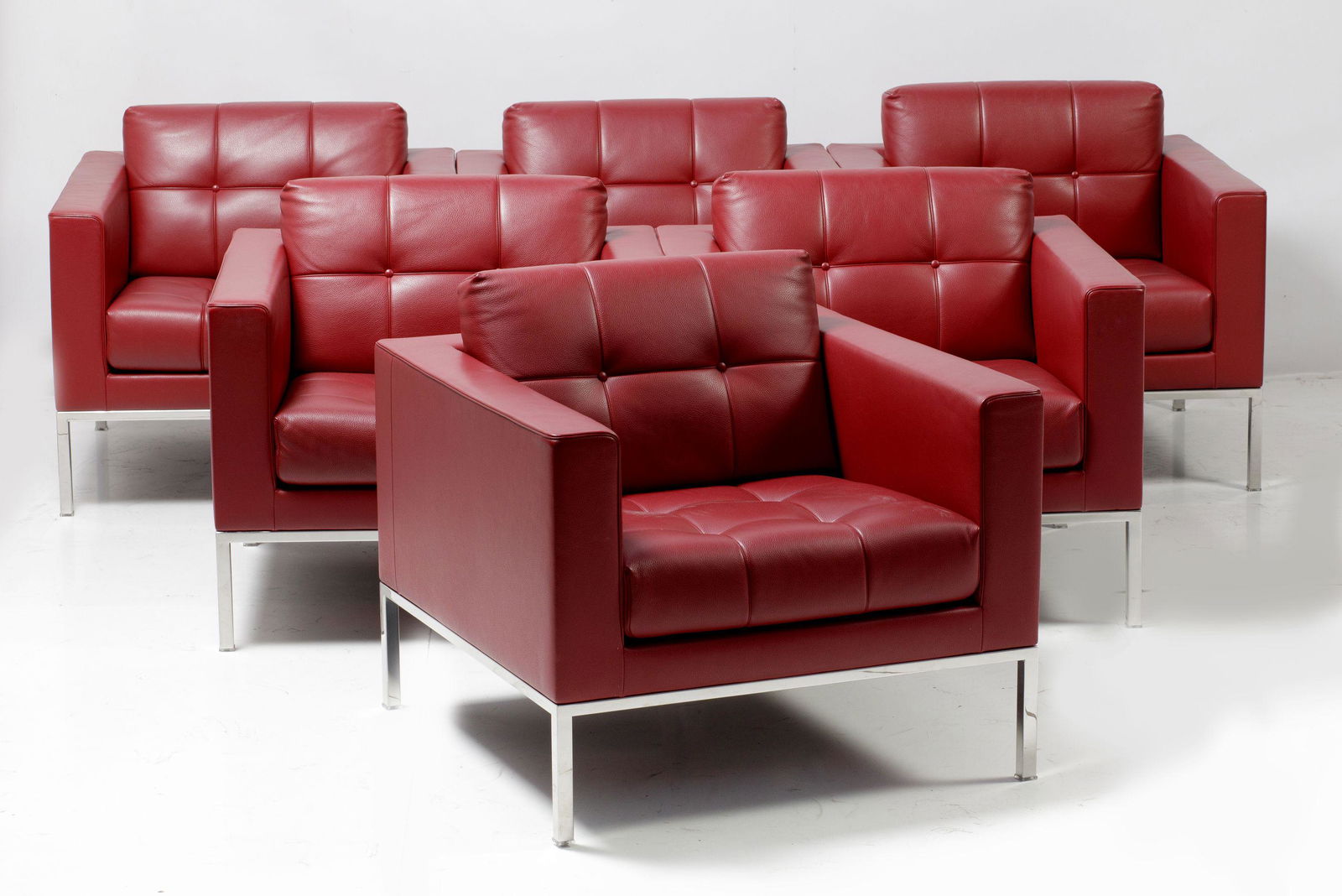 6 red leather armchairs from the house De Sede: Set of six red leather armchairs, steel legs, by De Sede. 75 x 82 x 80 cm.