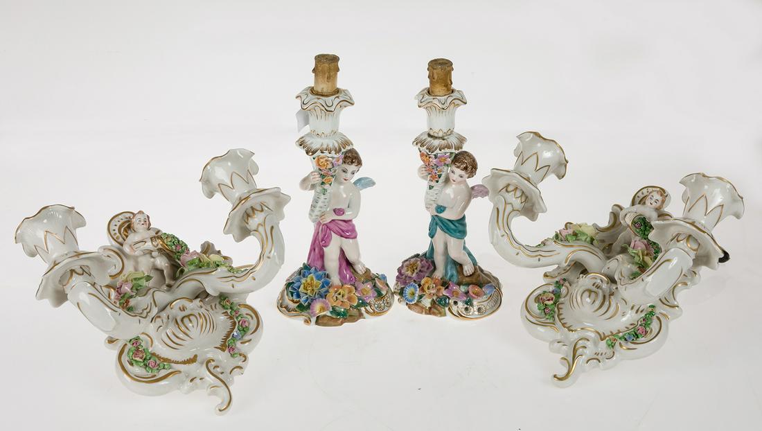 Pair of porcelain sconces, Rudolstadt-Volkstedt,: Pair of porcelain sconces, Rudolstadt-Volkstedt, Germany, med.S.XX. Enameled and partially gilded porcelain with amorcillo and flower decoration. With marks. Measures: 24 cm. . .