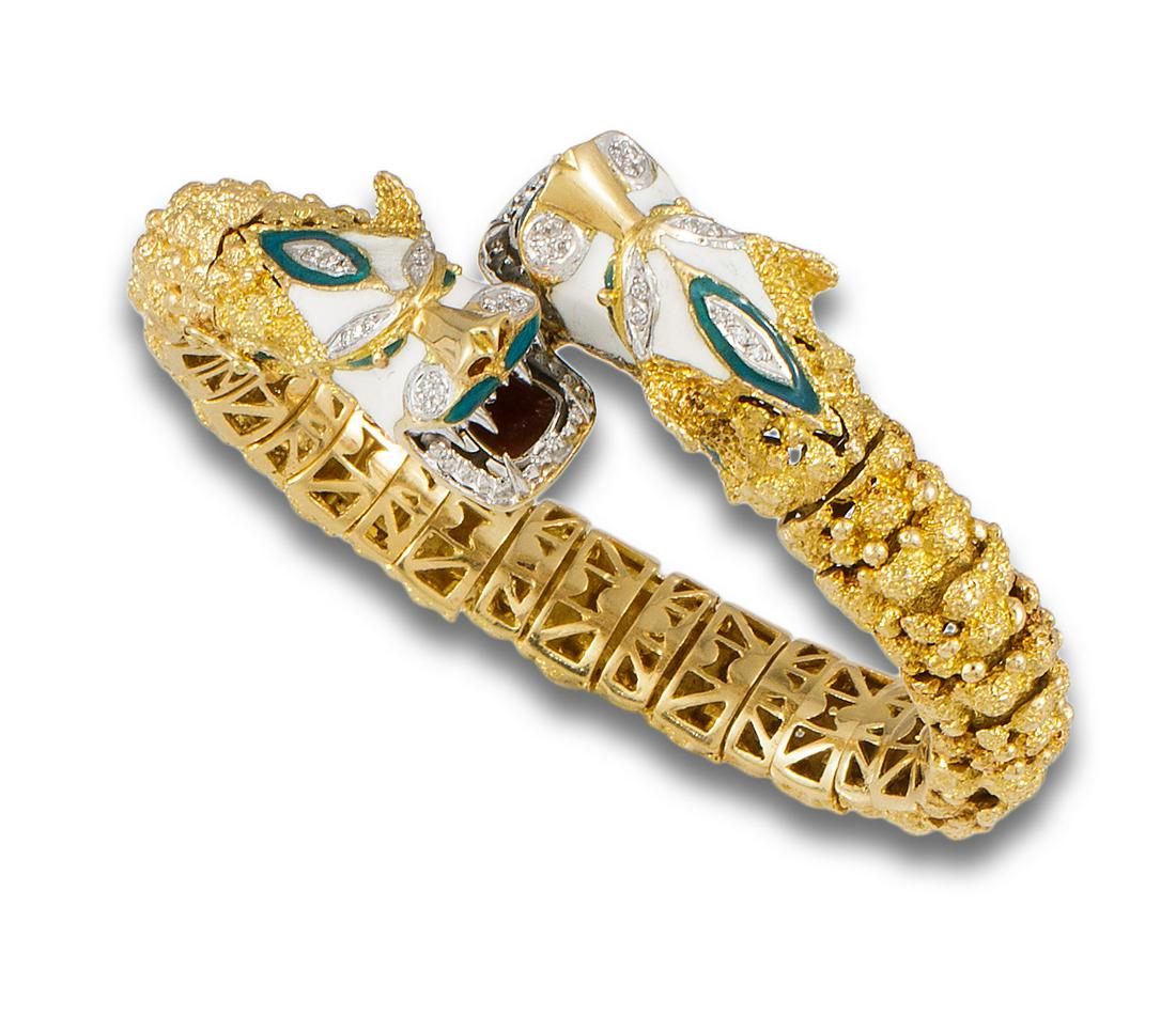 Bracelet, 70s, 18 kt. yellow and white gold with two dragon heads facing each other in enamel and (1 of 1)