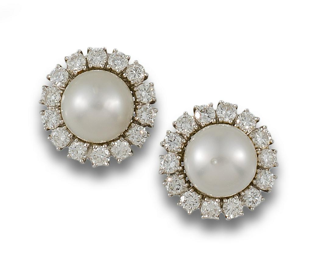 18kt white gold rosette earrings composed of a central mabÃ© pearl. (1 of 1)
