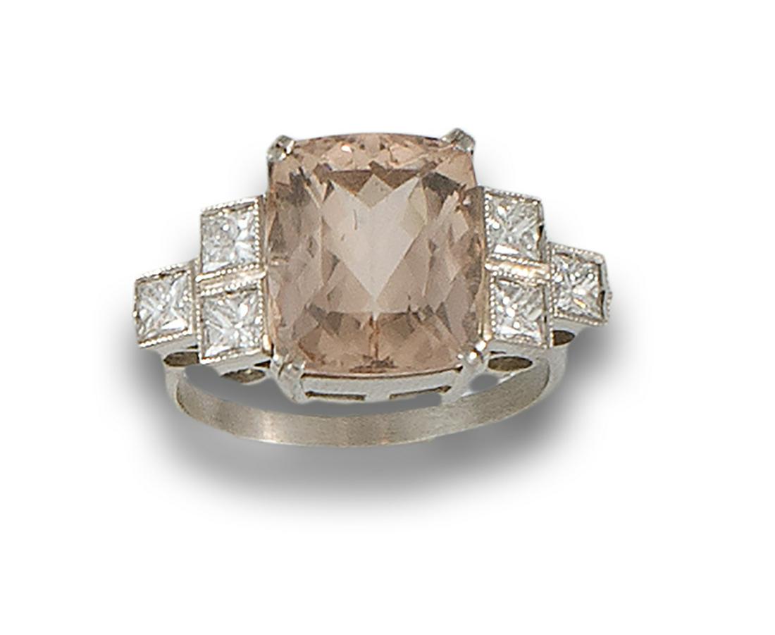 Art Deco style platinum ring comprising a central emerald-cut morganite flanked by carrÃ©-cut (1 of 1)