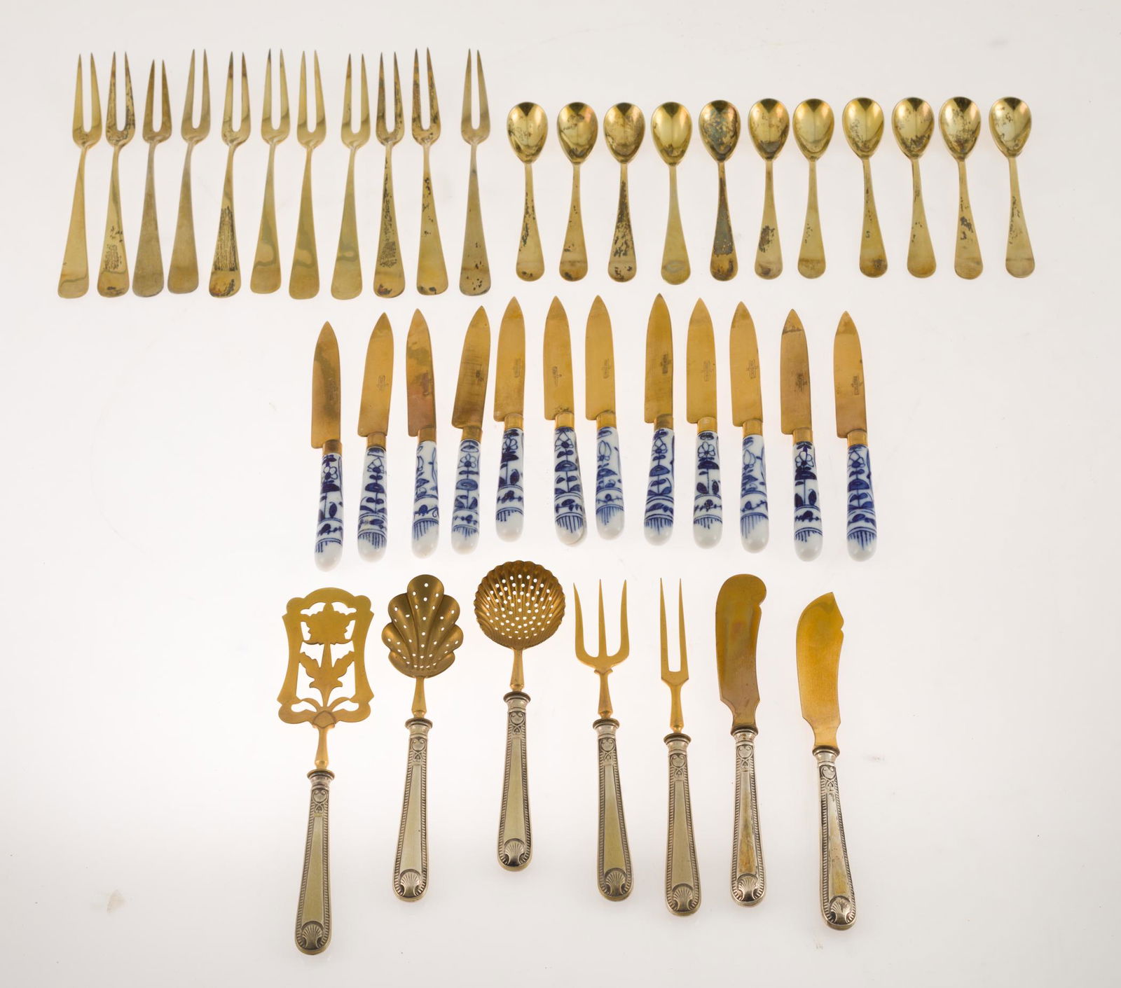 Set of gilded silver and gilded metal appetizer cutlery. Consisting of 11 forks, 11 teaspoons and 12 (1 of 1)