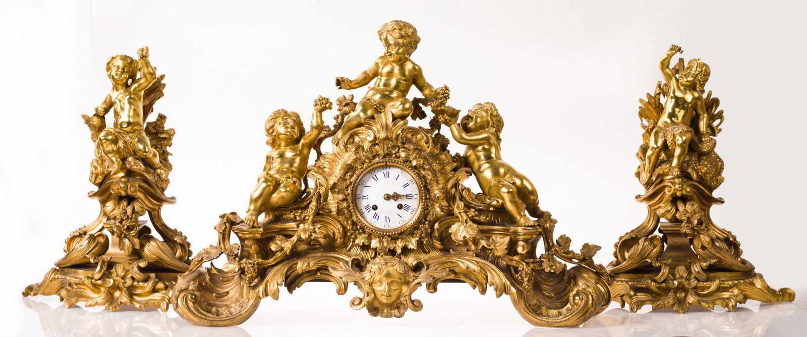 In Rococo taste with decoration of pebbles and putti with bunches of grapes. Paris machinery clock (1 of 1)